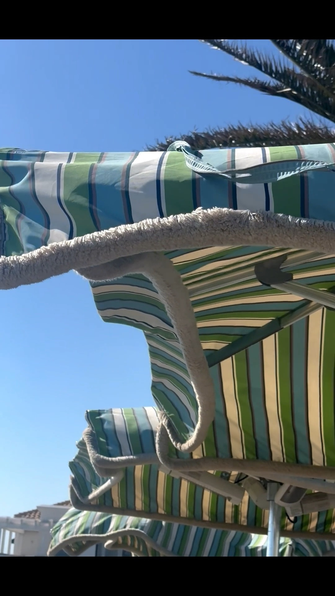 Weekend mood ☀️🌊
Striped fringe umbrellas, ocean breeze, and that effortless resort feeling I never get tired of.

#ResortStyle #FringeUmbrella #OutdoorLiving #CoastalStyle #VacationVibes #PatioDecor #OutdoorDecor

#LTKdayinmylife #LTKHome #LTKSaleAlert
