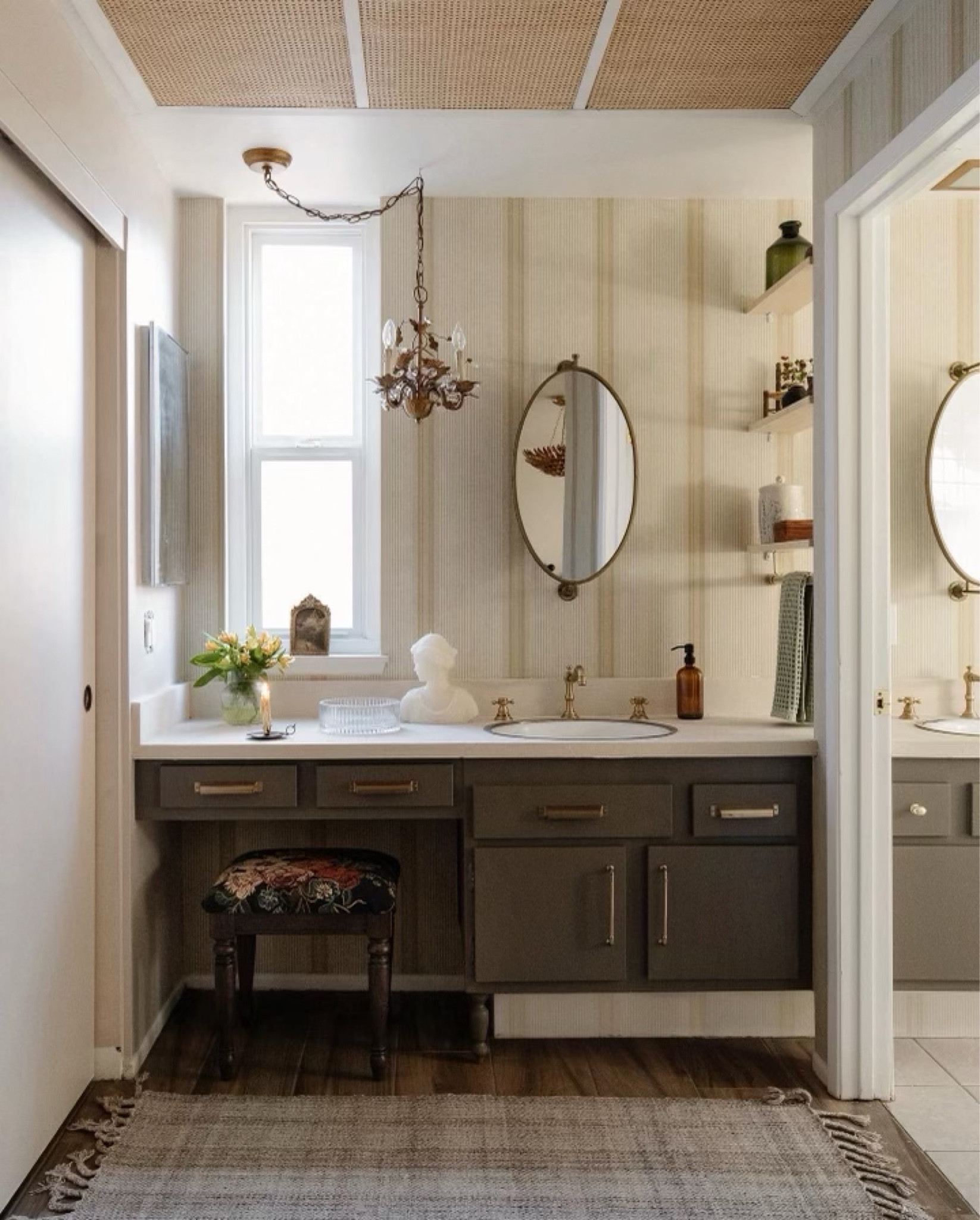 Obsessed with this bathroom makeover I did for the Sonza Family! I love the wallpaper, dark vanity and beautiful decor accents.

#LTKhome #LTKunder100 #LTKunder50