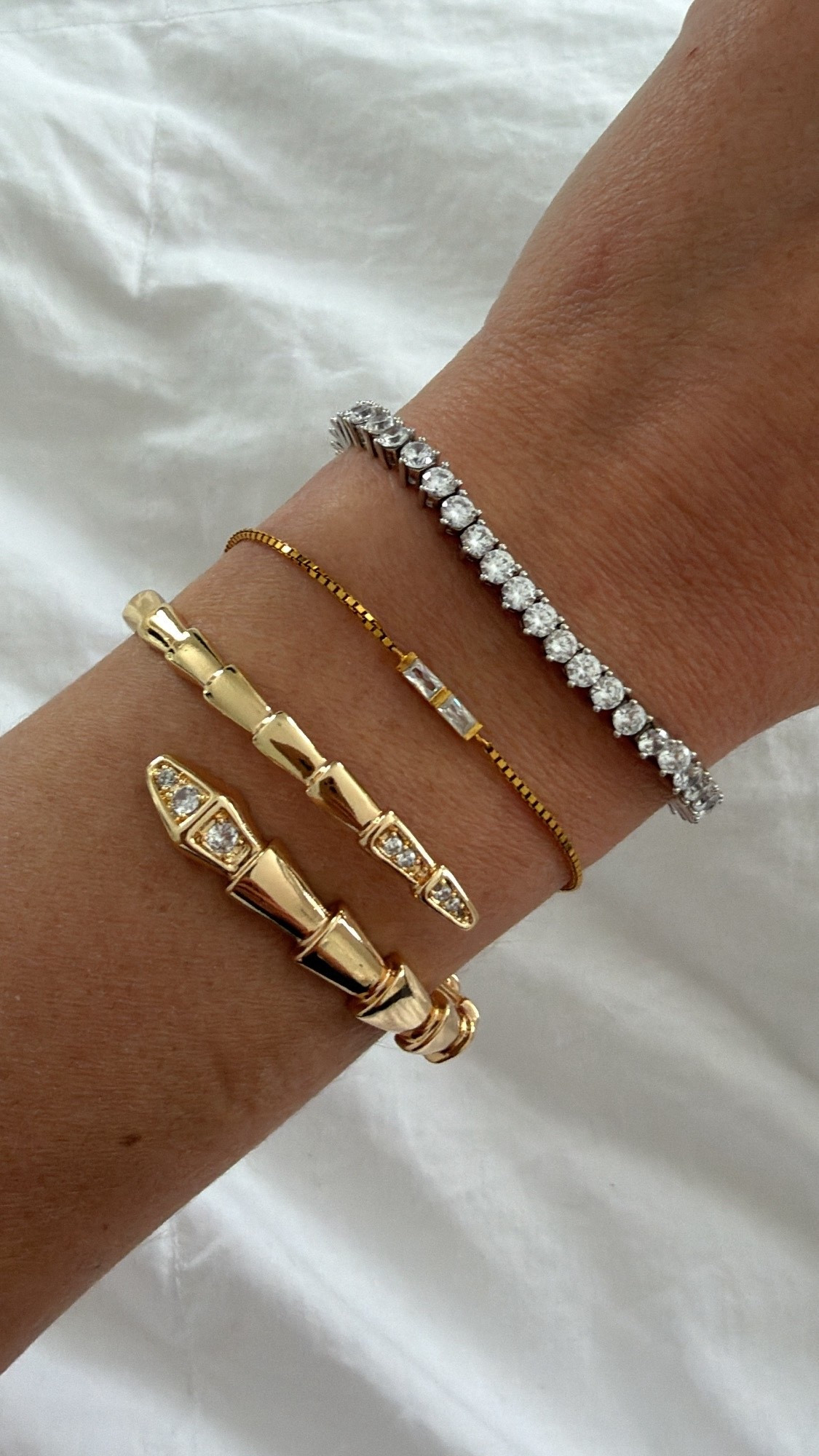 Use code: CWATTCM and save 10% off Caitlyn minimalist jewelry. Snake cuff bracelet, birthstone bracelet, diamond, tennis bracelet look for less, silver, gold, Mother’s Day.

#LTKSaleAlert #LTKMothersDay