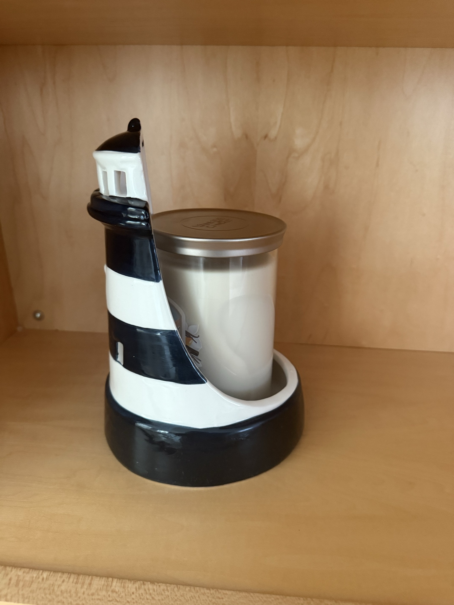 How cute is this lighthouse candle holder? Perfect for the nautical obsessed (like me!) who love coastal decor. 

#LTKSeasonal #LTKPetite #LTKHome