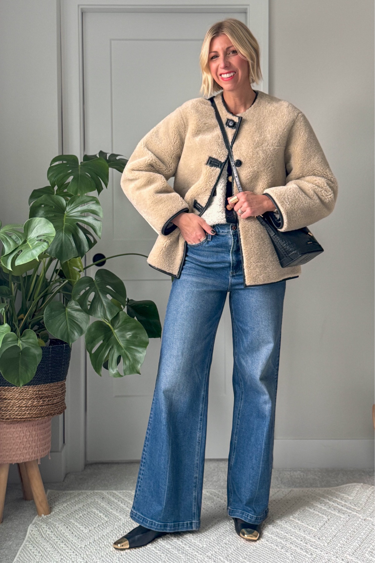 Dress up wide leg jeans this holiday season by pairing them with a Lady cardigan, trouser, socks, and statement flats. Add a cozy Sherpa jacket for warmth.

#LTKHoliday #LTKOver40 #LTKStyleTip