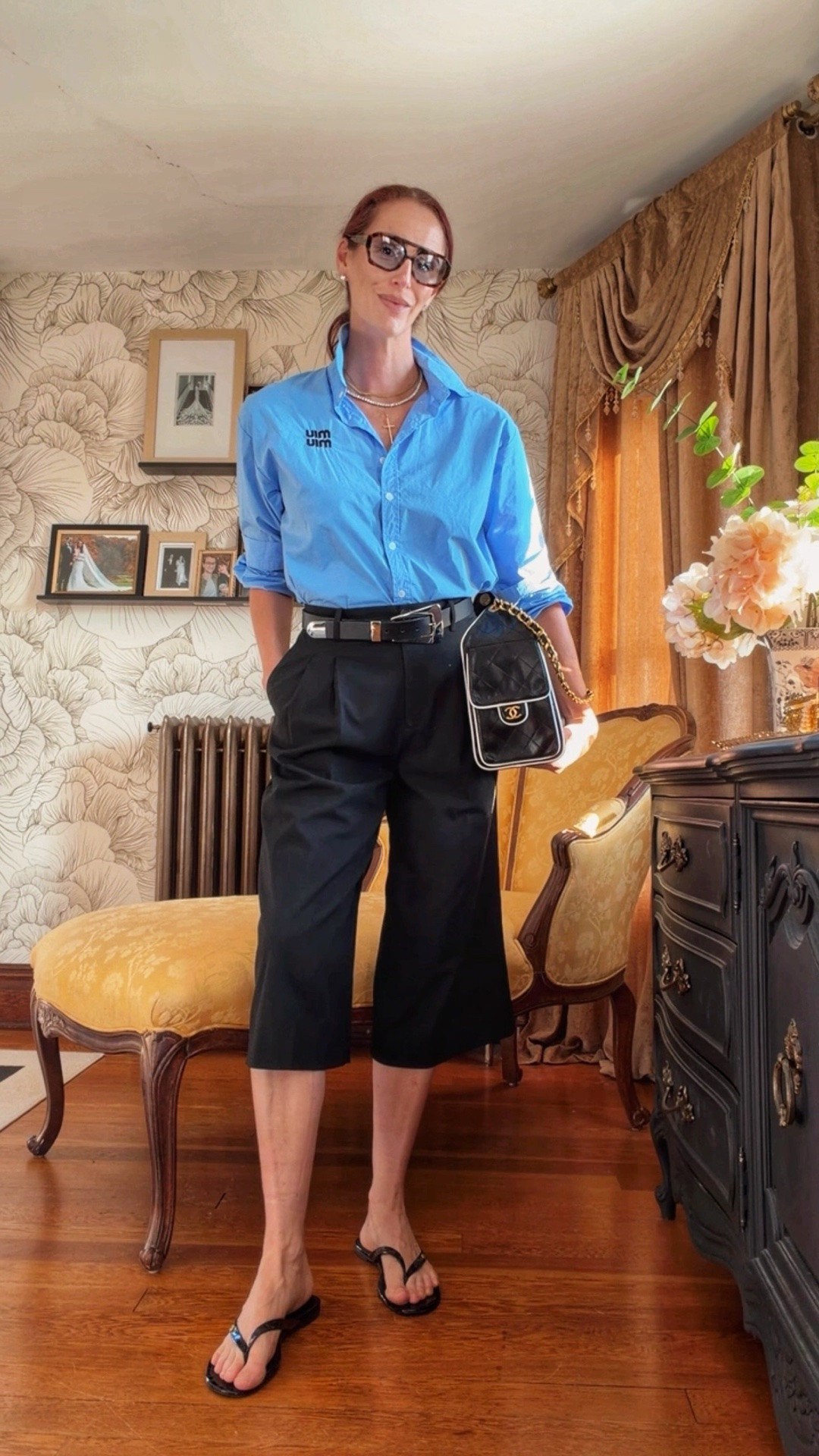 Today’s outfit formula: menswear-inspired, with a feminine finish. 💙

A crisp blue button-down tucked into cropped tailored trousers, finished with a statement belt, vintage-feeling Chanel, oversized frames and barely-there sandals. I love the contrast of something structured and polished with accessories that make it feel a little more unexpected.

Proof that your wardrobe staples don’t have to feel basic.

#LTKStyleTip #LTKFashion #PersonalStylist #OutfitInspo #EverydayStyle #StylistApproved

#LTKootd #LTKgrwm