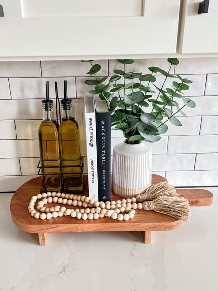 Kitchen Counter Styling Ideas | Kitchen Counter Fall Decor | Kitchen Countertop Decor | Kitchen Staging Items

Wooden Cutting Board Risers, Wooden Serving Tray, Decorative Kitchen Cookbooks, Kitchen Decor, Neutral Kitchen Decor, Target Kitchen Decor, Faux Plant & Vase, Wooden Bead Garland, Glass Oil Pour Dispenser 

#LTKSeasonal #LTKhome
