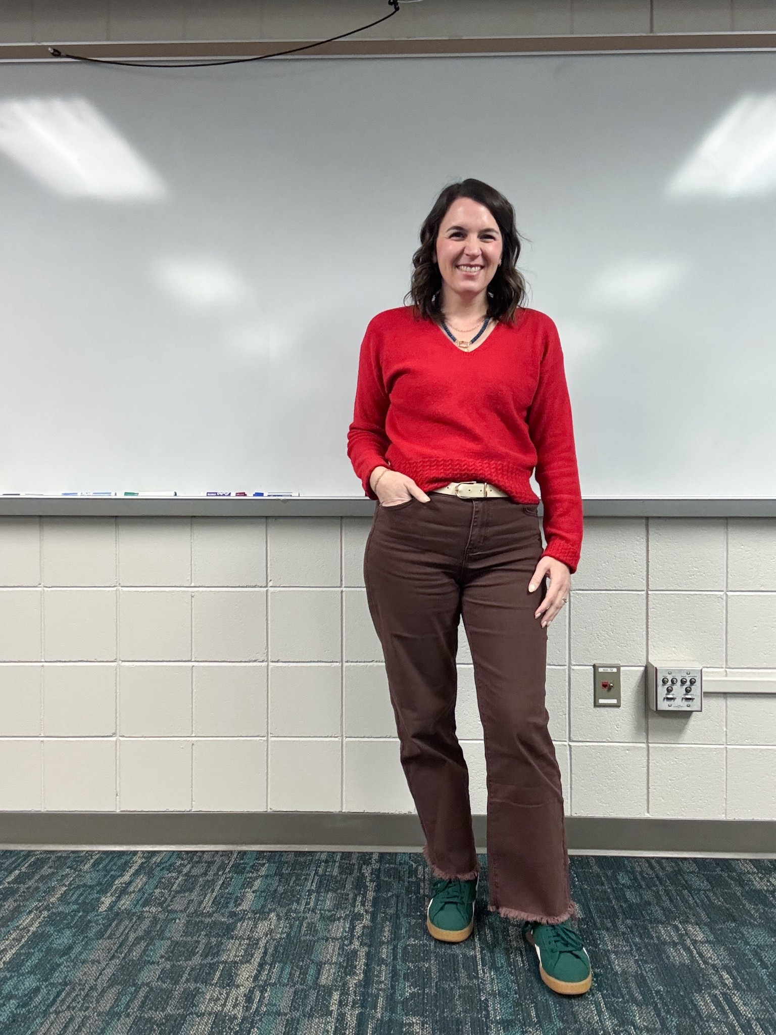 A true red v neck sweater? Say no more!

Sweater: small
Pants: medium 