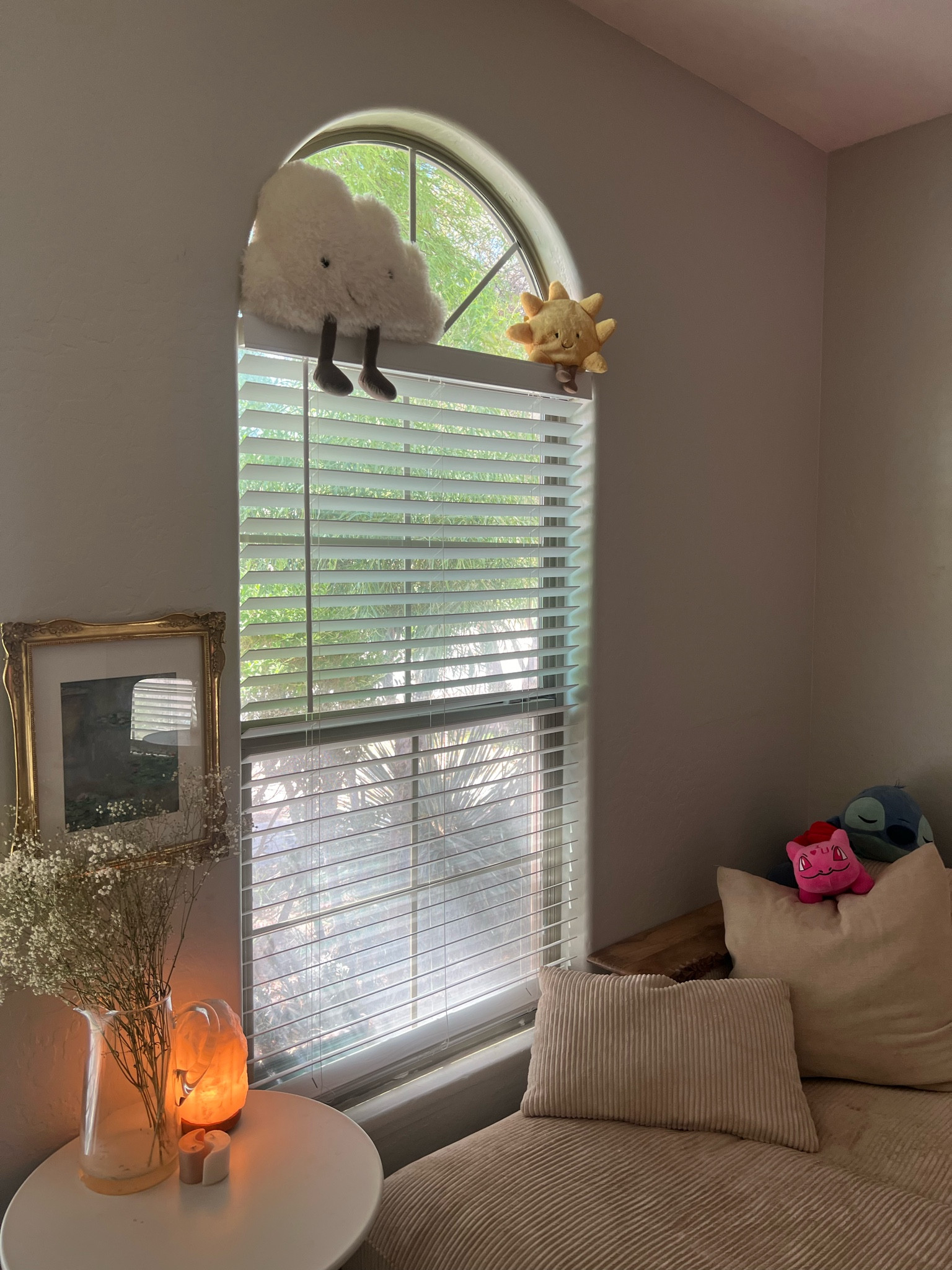 Window seat chaise lounge, neutral aesthetic with wood tones, plushies, gold frames, babys breath, salt lamp

#LTKhome