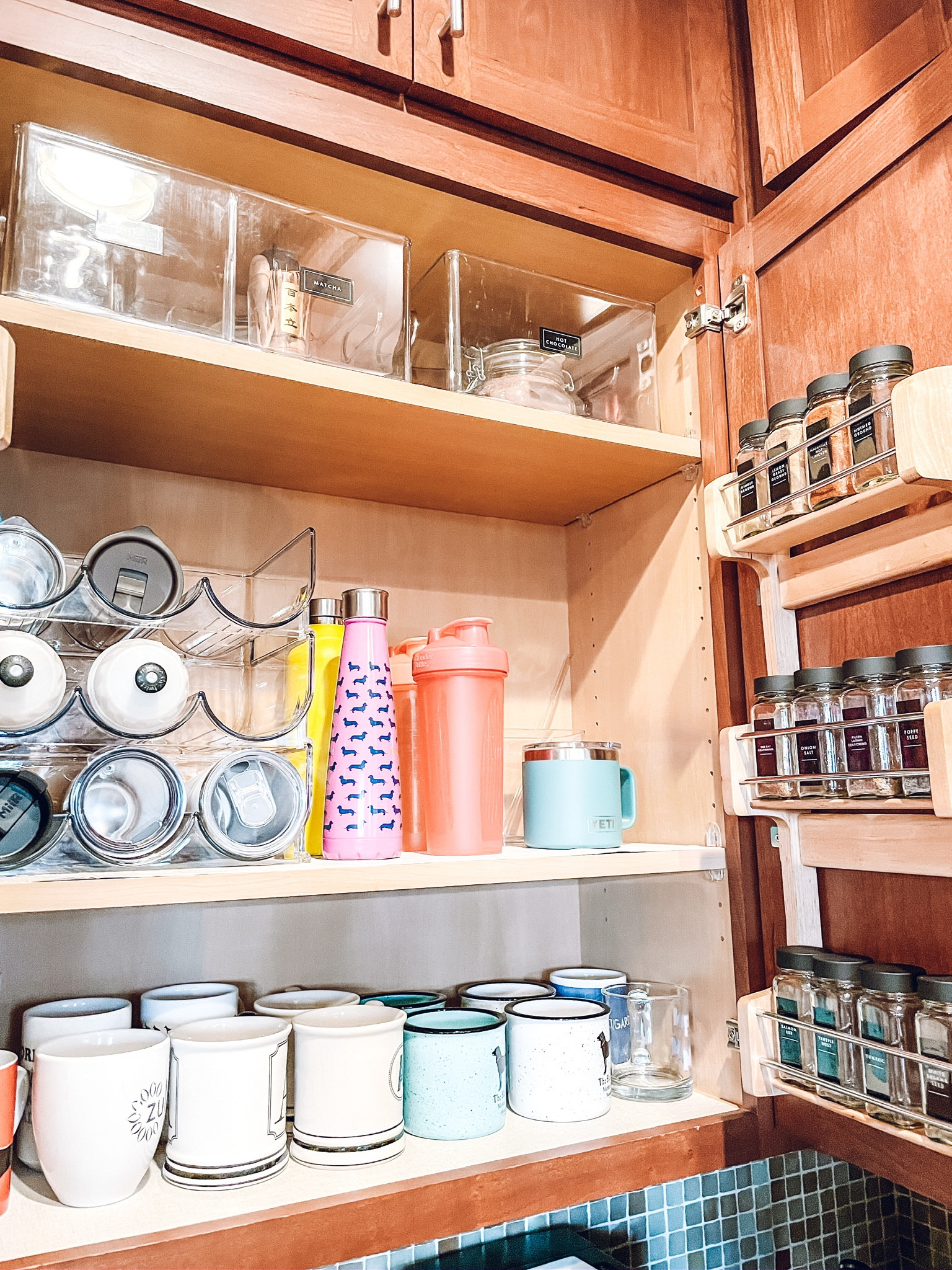 Kitchen organization✨ Neat Method Spice Jar Sets. The HOME EDIT Divided All-Purpose Bin. mDesign Plastic Water Bottle Storage Organizer Rack. Amazon YETI Rambler 14 oz Mug.