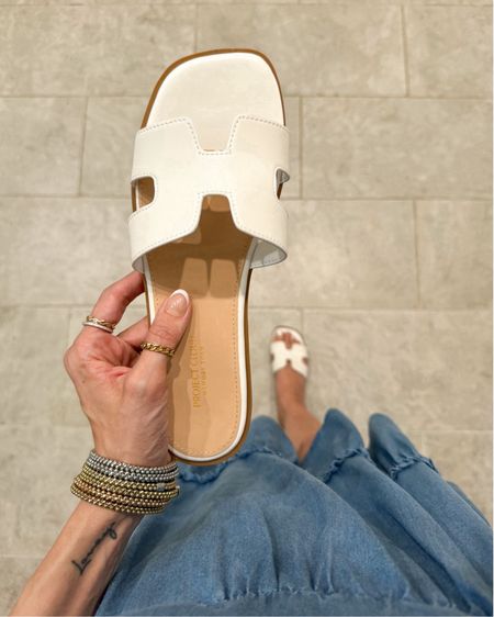 They fully restocked some sizes in our fave sandals AND added more colors!! Hurry because they sell fast! This look for less is such a great deal!! I’ve had a few pair of these white slides and this is the closest look to the Hermes style that I’ve seen so I had to grab them right away! True to size and they come in a few colors! I also have the cognac and love. TBH, I returned the tan because they had a mustard tone to them. Also linking my fave rings and bangles because they don’t clank and I always get compliments on them! 

#LTKFindsUnder50 #LTKShoeCrush #LTKParties