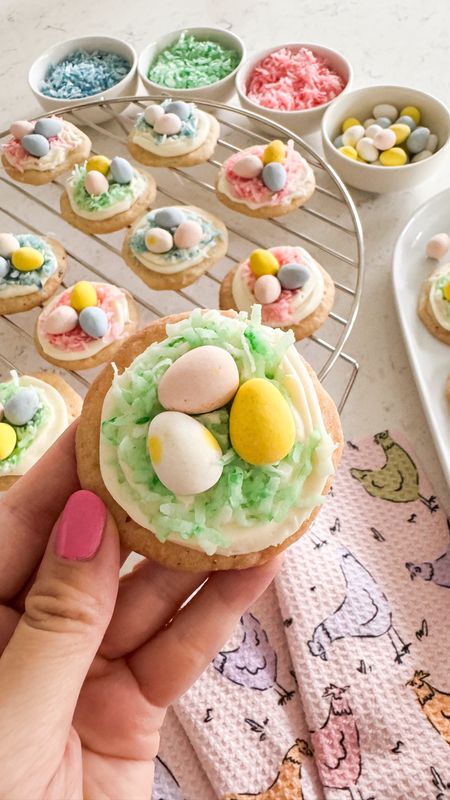 EASTER EGG NEST SUGAR COOKIES! 🍪🪺 Seriously how cute are these?! Easy to make and a fun Easter activity with your kids! I used pre-made sugar cookie dough, white frosting, coconut flakes, food coloring, and mini Cadbury eggs! #eastercookies #cadburyeggs 

#LTKparties #LTKhome #LTKSeasonal