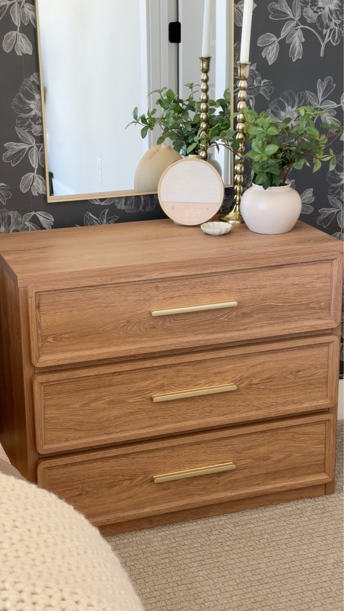 I can’t get over how good this affordable nightstand looks in our space. The warm wood finish, clean lines, and brass hardware give it a high-end look without the high-end price tag. Styled with a few simple decor pieces, it’s the perfect blend of function and style. #LTKHome #BedroomDecor #AffordableHomeDecor #NightstandStyling #HomeFinds #BedroomInspo

#LTKSeasonal #LTKHome