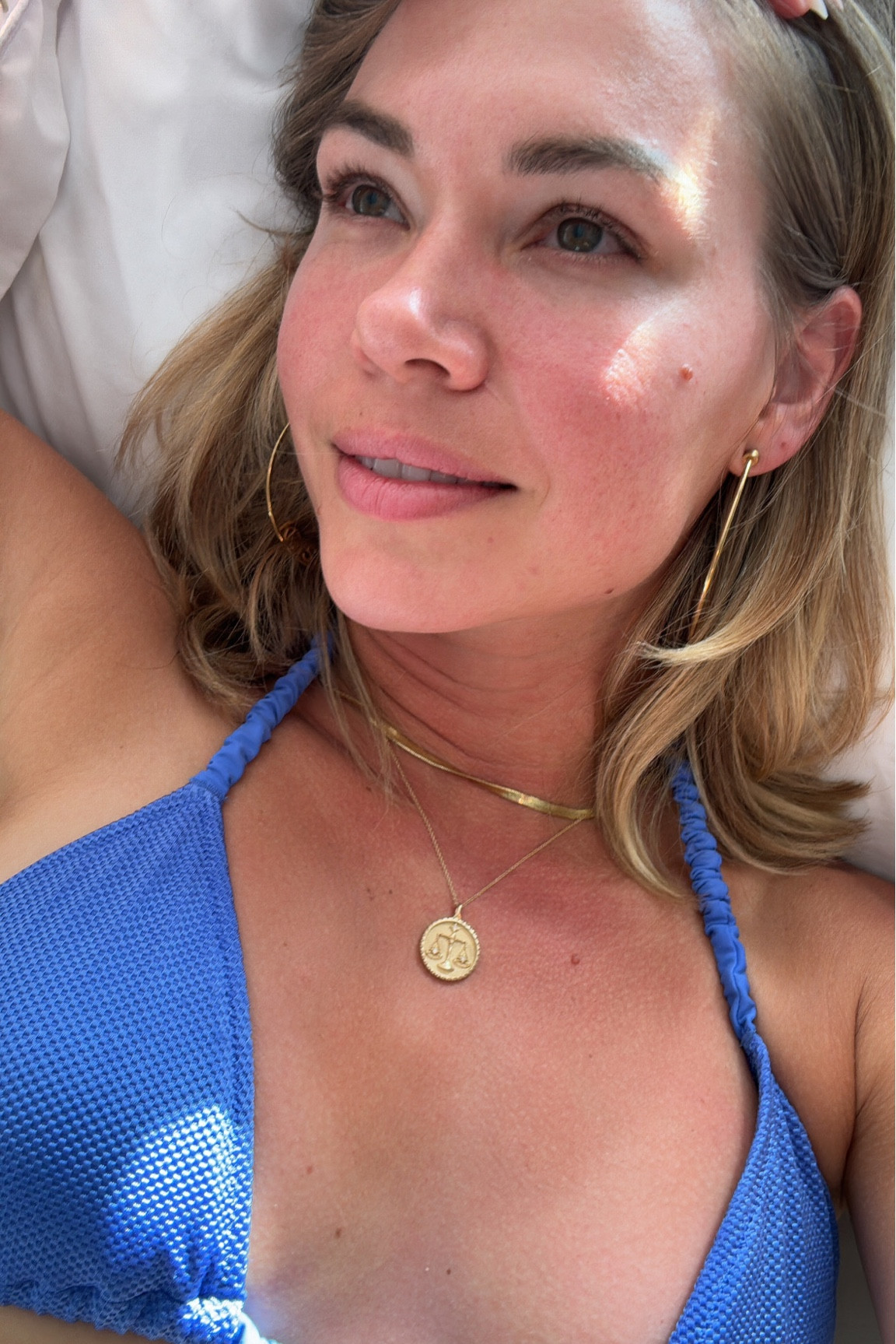 Zodiac pendant. I gave these to my bridesmaids and we still wear them every day. ☀️✨