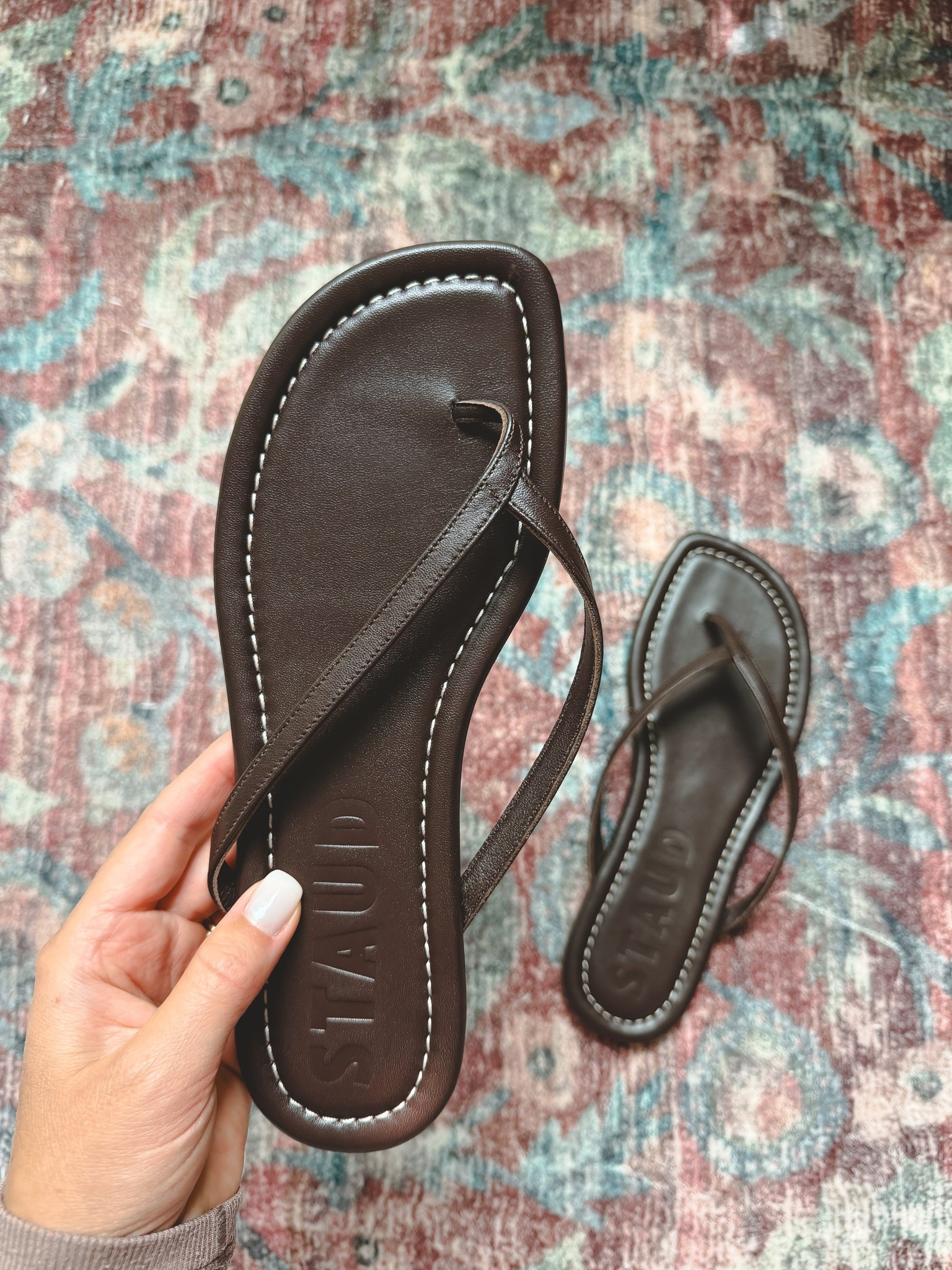 The comfiest leather flip flop sandals! The chocolate brown is super chic

#LTKSeasonal