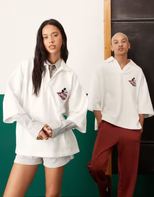 ASOS DESIGN Disney Unisex oversized polo shirt with embroidered Mickey Mouse print in off white | ASOS (Global)