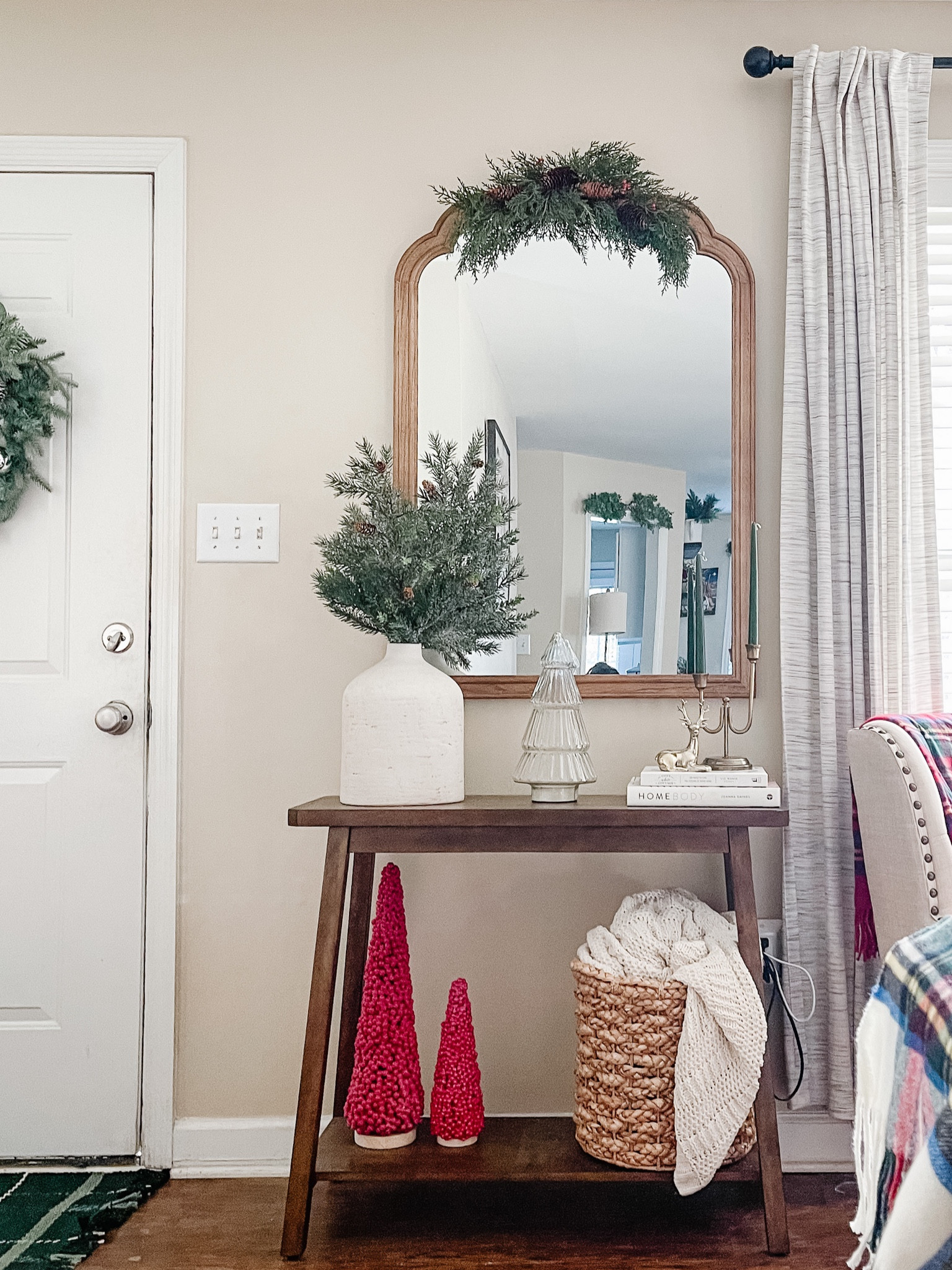 Christmas entryway decor 

#LTKhome #LTKHoliday #LTKSeasonal