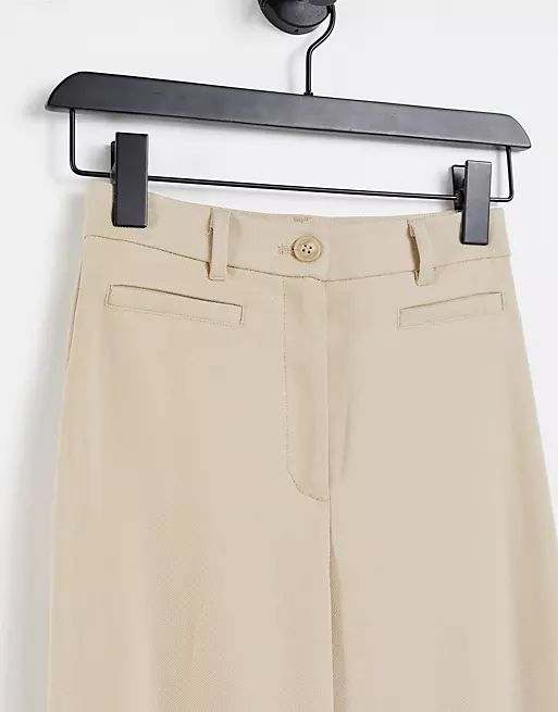 Monki Stacy recycled flare pants in beige | ASOS (Global)