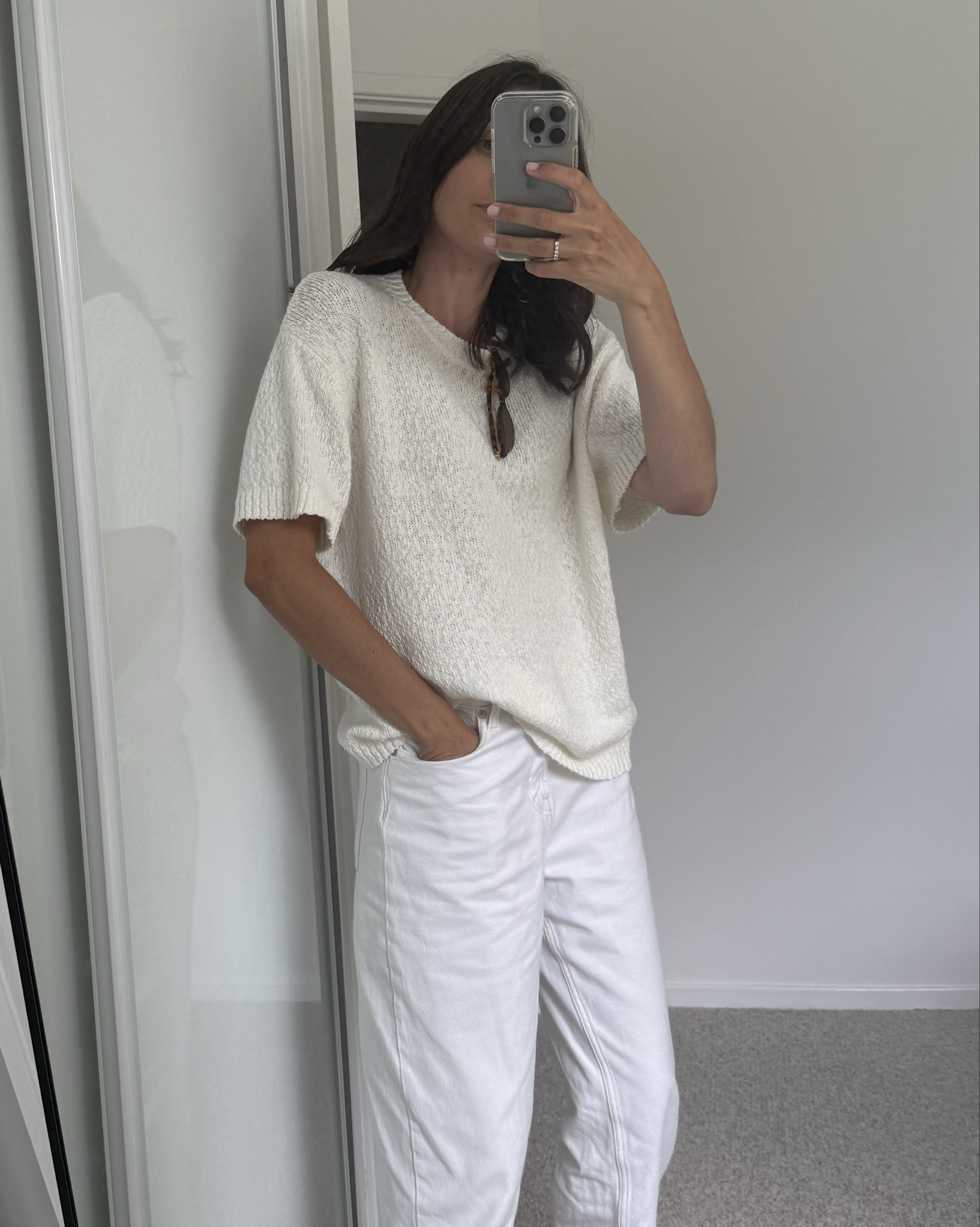Relaxed weekend outfit featuring the white H&M barrel jeans I wear sooo much! Top is a new style from Nimble Activewear. It’s super comfy. I paired with Miu Miu sunglasses and thong slides!  