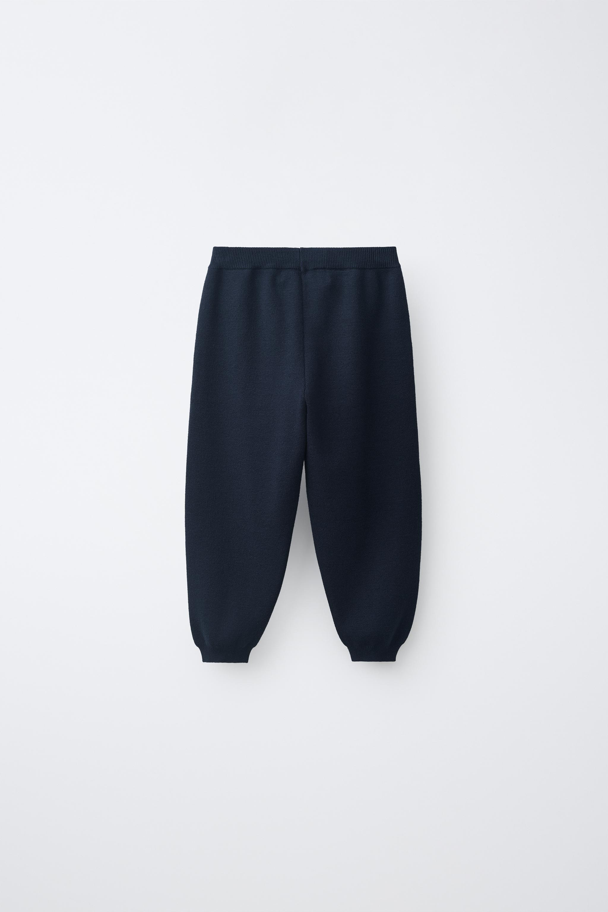 Knit jogger pants with an elastic waistband and front drawstring appliqu\u00e9. Front patch pocke... | Zara US