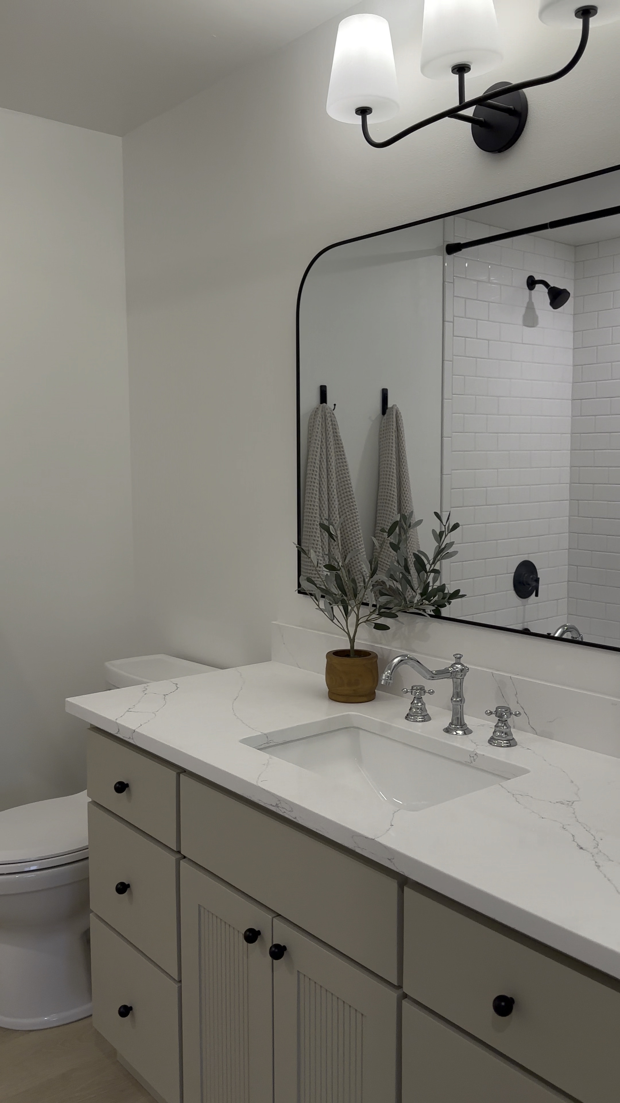 Kids bathroom, main bathroom, neutral bathroom, gray vanity, bathroom mirror, bathroom lighting, bathroom decor, interior design, interior designer 

#LTKHome #LTKStyleTip #LTKSaleAlert