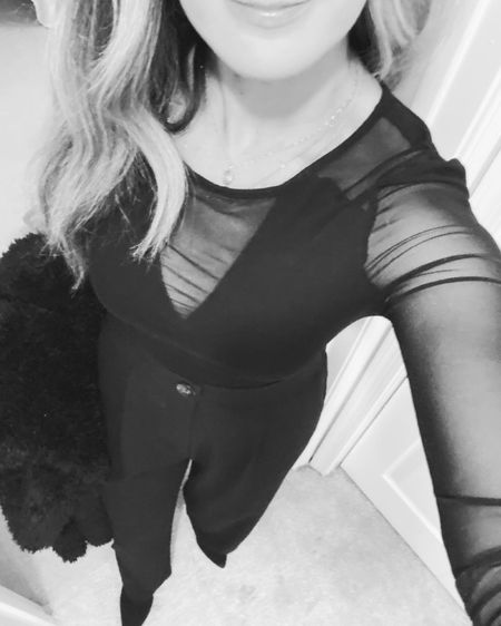 Sexy sheer black top. My going out top! Size small. Amazon finds. Paired with high waisted wide leg black pants, black boots and my fuzzy fleece or Teddy jacket in black. SO WARM!! I got a ton of compliments on it. 

#LTKfindsunder50 #LTKsalealert #LTKstyletip