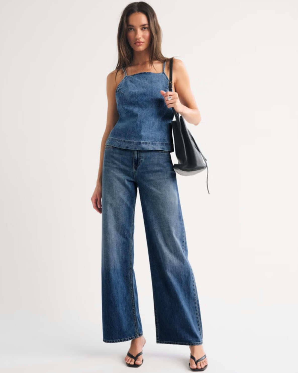 Summer staple 🤍 The Abercrombie Bra-Free Linen-Blend Denim Tie-Back Cami is part of their bra-free collection with built-in support (removable pads!) for an easy, no-fuss fit. I love the flattering apron neckline and adjustable tie-back detail, plus the lightweight linen-blend denim fabric is perfect for warm days. So cute styled with shorts, linen pants, or a matching set ✨ 

 #LTKdayinmylife #LTKgrwm #LTKootd