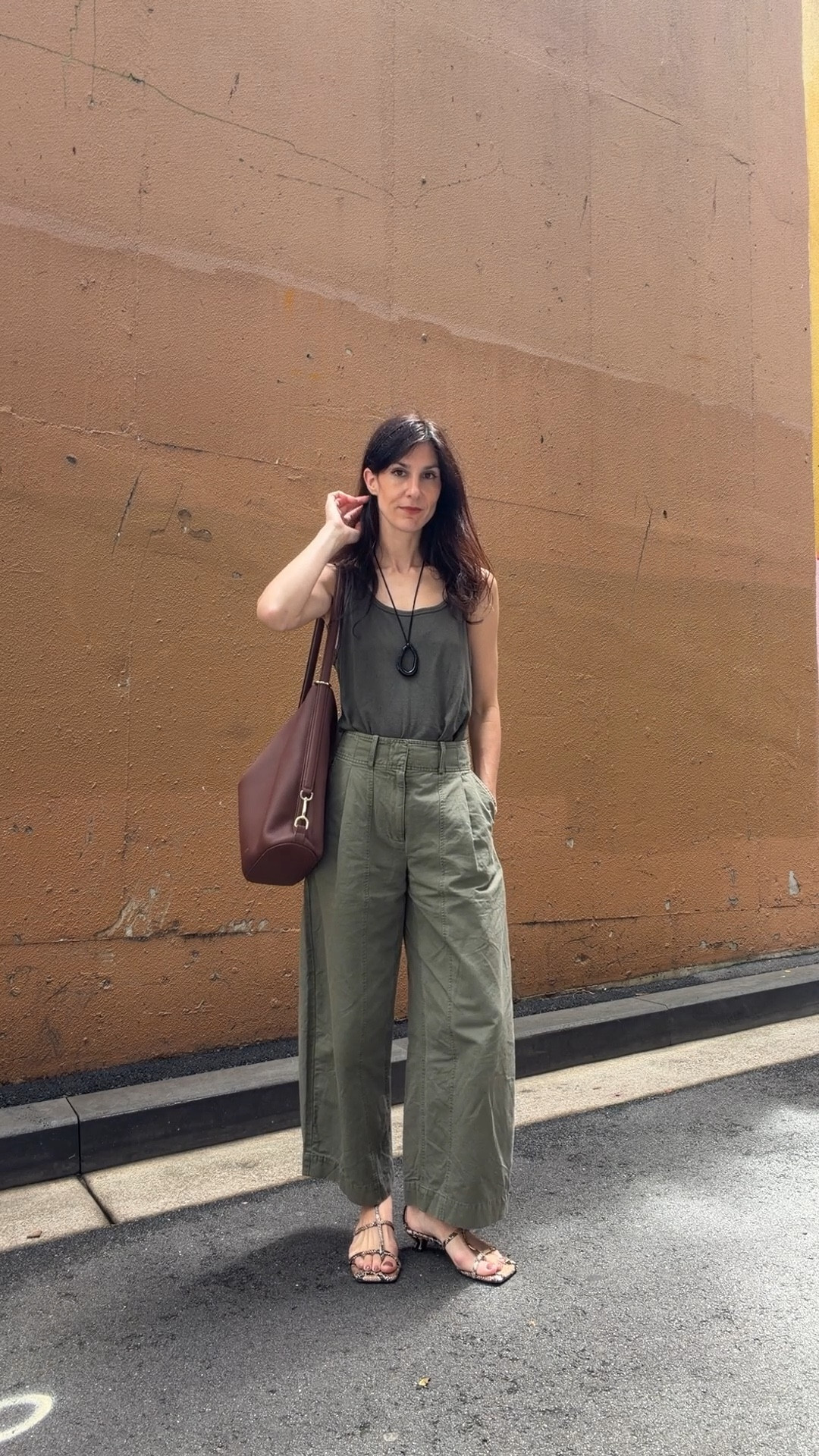 Tank is OZMA size XS. Pants are size US2. Shoes are usual EU40