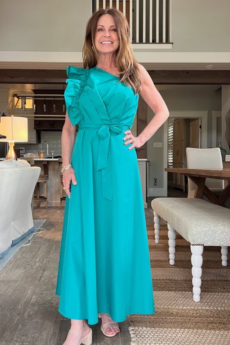 A pretty midi dress with one shoulder styling. This is the green, but it comes in other colors too. Fun for spring and summer events. Longer on me at 5'2". Wearing size small.
#weddingueststyle #formalwear #springfashion #outfitidea

#LTKWedding #LTKStyleTip #LTKSeasonal