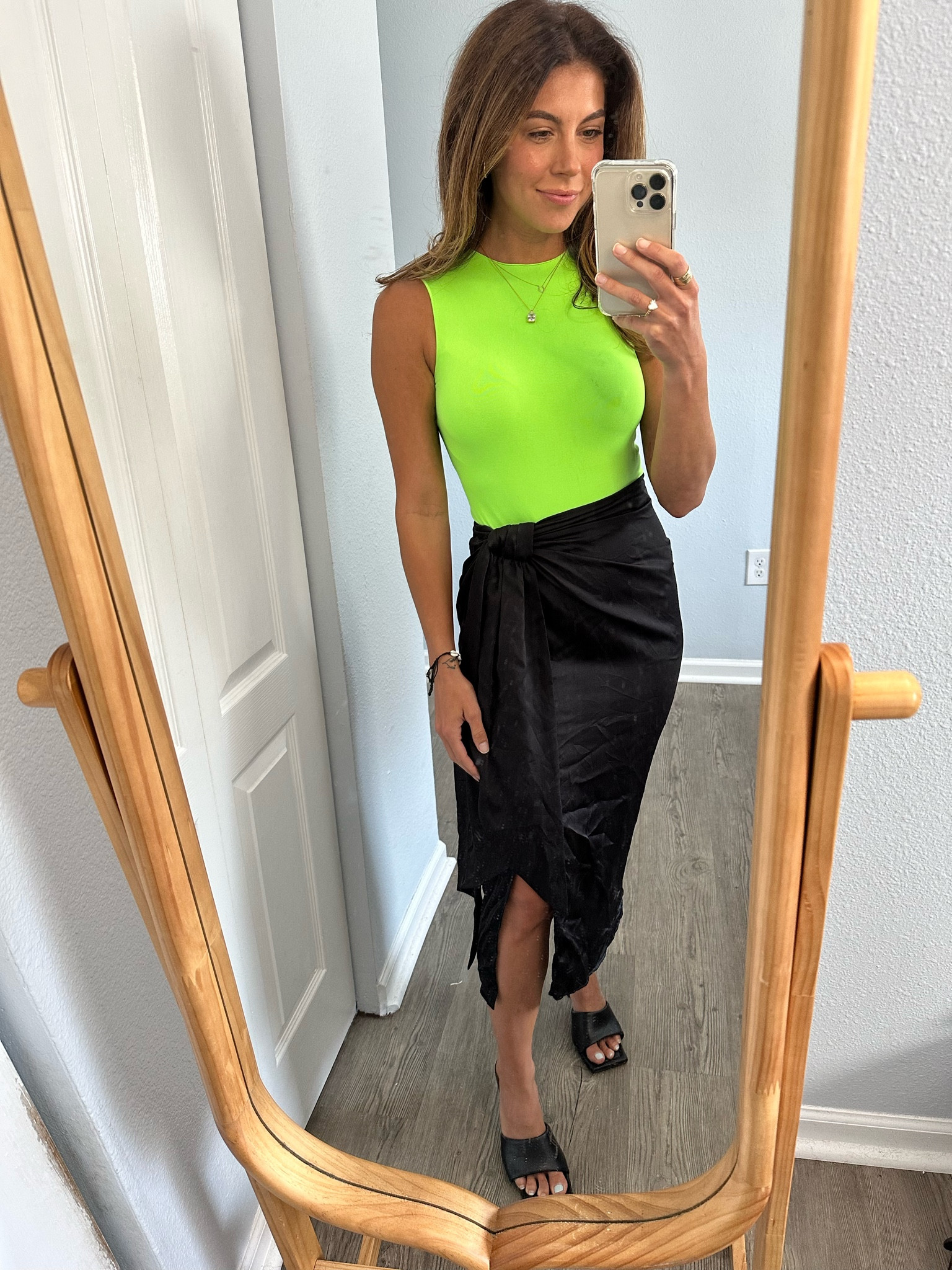 Had to bring out old faithful- my black wrap skirt to pair with my neon bodysuit. This is a simple and easy look to put together but is chic and edgy for happy hour, dinner, networking, or more casual work environments 💚🖤

#LTKSeasonal #LTKworkwear #LTKunder100