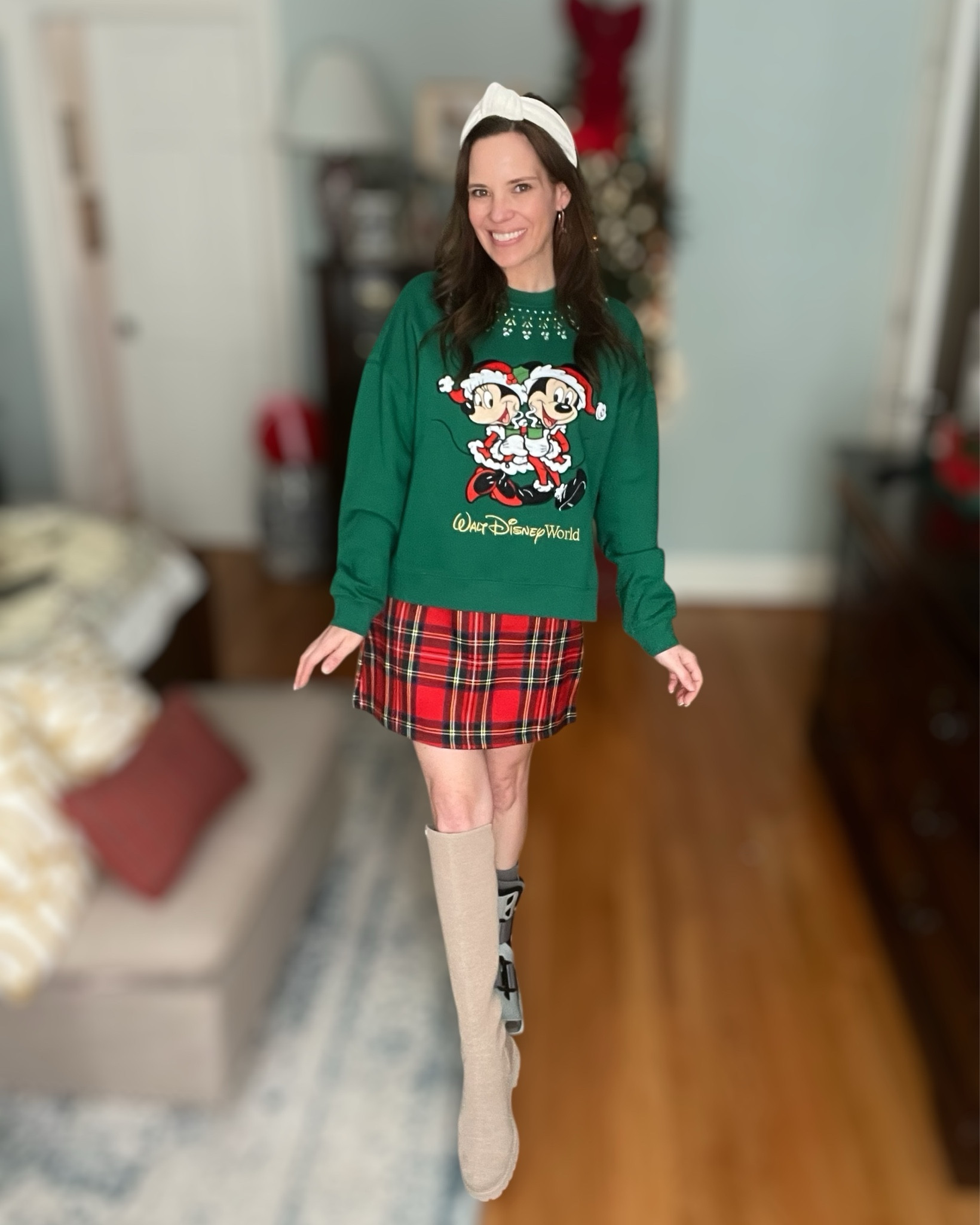 🎄 Festive Mickey & Minnie Christmas Outfit – Classic Holiday Plaid Look ❤️💚✨

This outfit is giving pure Christmas magic! ❤️💚 I styled the green Santa Mickey & Minnie Walt Disney World sweatshirt with the cutest red tartan plaid mini skirt for that classic holiday look that never goes out of style. I added the cream chenille top knot headband from Walmart, my tall Vivaia woven boots, and the sweetest red bow hoop earrings for the perfect pop of holiday sparkle. This look is comfy, festive, easy to wear, and so perfect for park days, holiday photos, or December outings! 🎅🎁✨

Great for:
🎄 Disney holiday trips
🎁 Christmas card photos
✨ Holiday parties & cookie swaps
🛍️ December errands
📸 Festive content days

⸻



Disney Christmas outfit, Mickey and Minnie holiday sweatshirt, green Christmas sweatshirt outfit, plaid mini skirt outfit, red tartan skirt Christmas look, festive winter outfit idea, Vivaia boots outfit, knee high boots winter style, Walmart headband, holiday accessories, Christmas park outfit, December fashion inspiration, cozy holiday look for moms, red and green outfit idea, classic Christmas aesthetic, cute Christmas outfits, Disney holiday merch outfit, festive plaid skirt look ❤️💚✨

#LTKTravel #LTKHoliday #LTKFindsUnder100