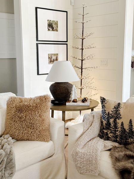 Save on this side table, lamp, twinkling twig tree, pillows and faux fur blanket!

#LTKHoliday #LTKhome #LTKsalealert
