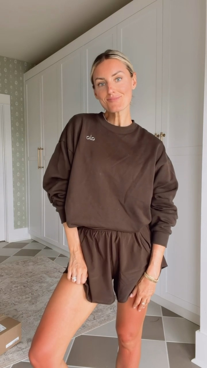Been grabbing this set when lounging at home for a cozy look when I still want to feel cute and put together! So soft too 😍 wearing M shorts and S sweatshirt. 

Loverly grey, alo chocolate brown set, crewneck shorts matching set womens, travel outfit ideas, airport outfit, elevated loungewear

#LTKSeasonal #LTKTravel