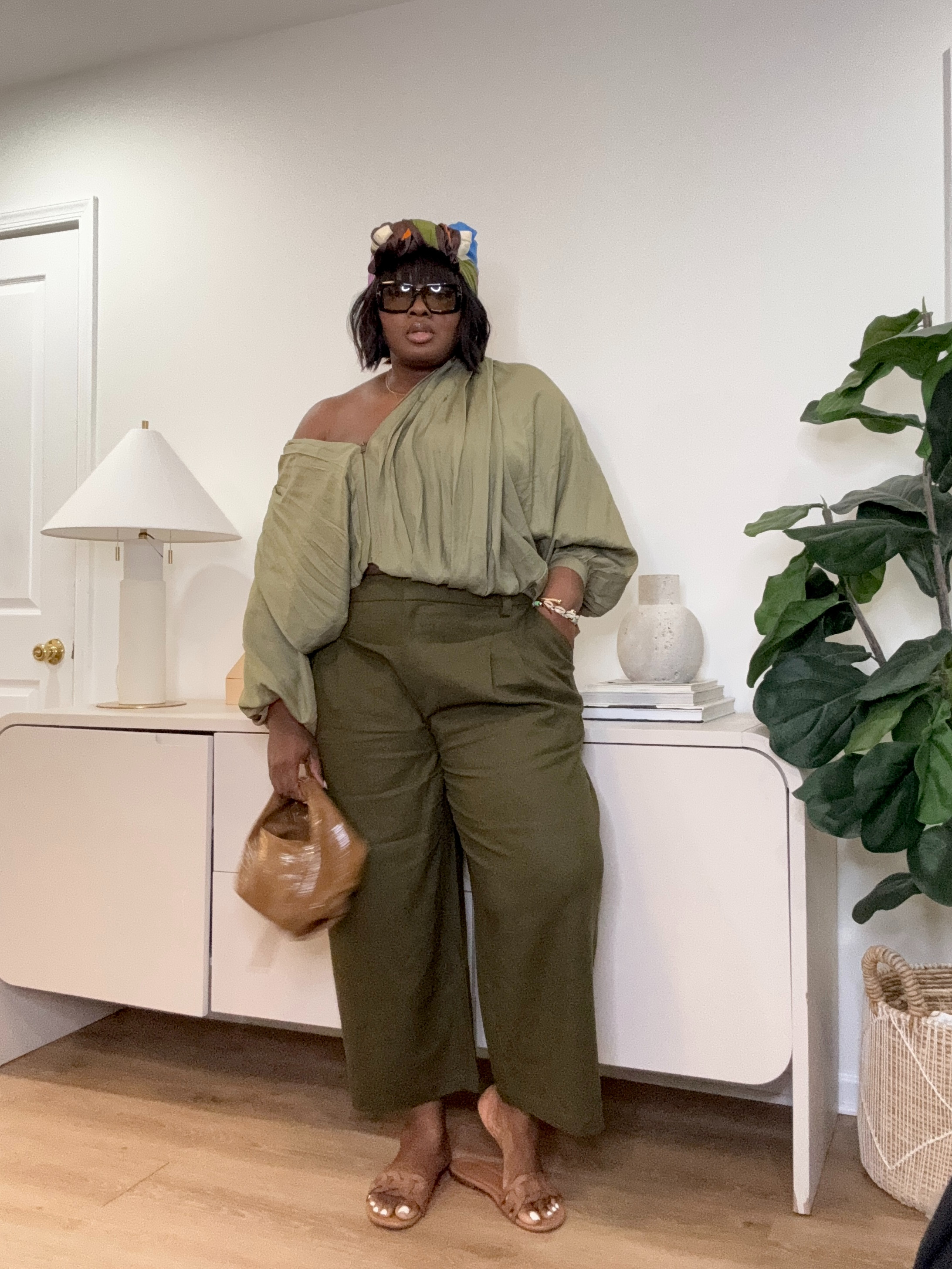 The outfit that makes me look way more put together than I feel. This is the kind of outfit that works for brunch, casual work days, errands, dinner, vacation… basically whenever you want to feel cute without trying too hard. #NeutralStyle #QuietLuxuryStyle #PlusSizeFashion #EverydayOutfit #WideLegPants #OliveGreenOutfit #EffortlessStyle #LTKStyle #CasualChic #FashionFinds 

 #LTKootd #LTKSeasonal #LTKMidsize