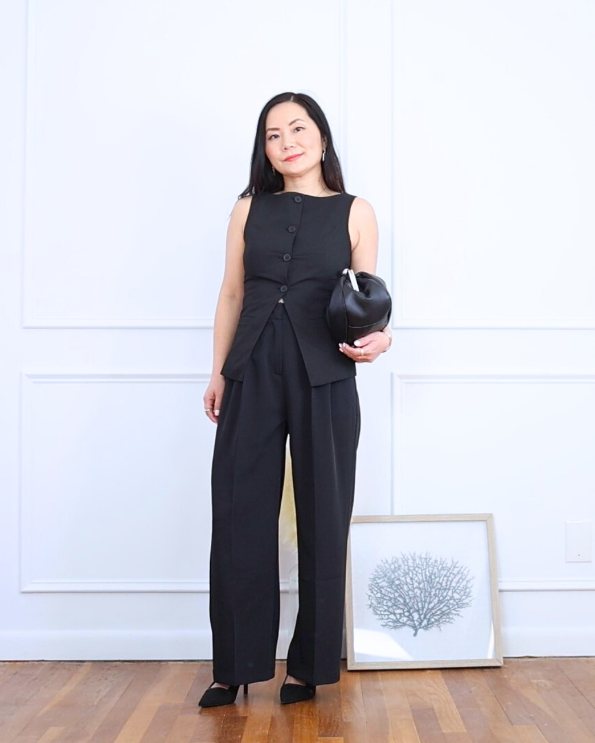 This black boat neck vest and wide-leg pants (Amazon find!) made me feel polished but comfy. Paired it with a clutch and pumps for a clean, put-together look. Perfect for petite frames like mine! I’m wearing size S.

#LTKOver40 #LTKPetite #LTKStyleTip