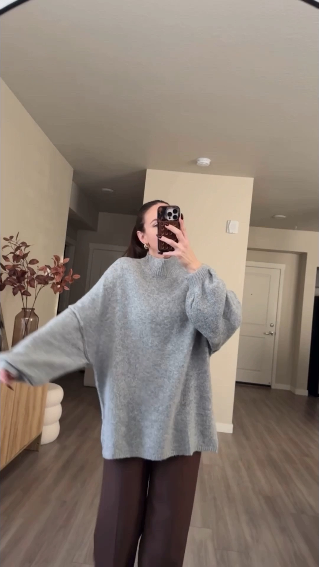 number one trending sweater on amazon right now!!

cozy sweater.  wearing medium.  no need to size up.  it's very oversized. 