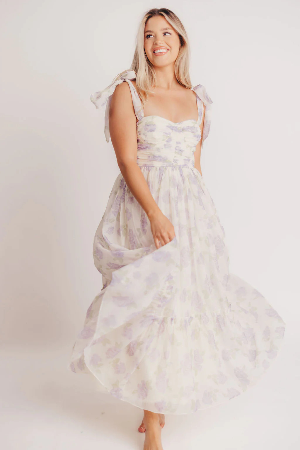Thalia Ruched Midi Dress with Tie Shoulder in Lavender Floral - Bump F | Worth Collective