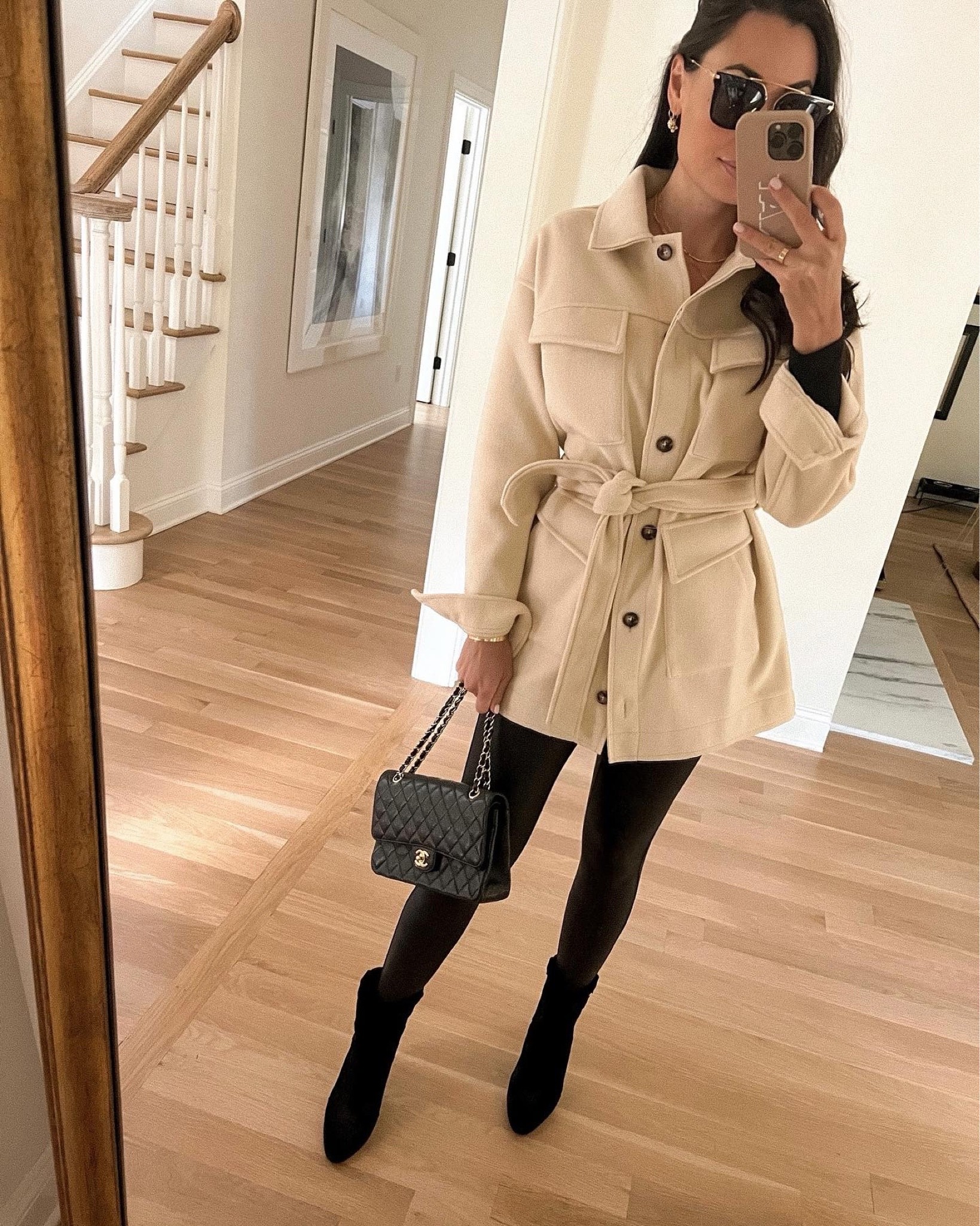 Kat Jamieson of With Love From Kat wears a cream jacket and black leggings with booties for fall. Designer bag, shacket, fall outfit. 

#LTKshoecrush #LTKitbag #LTKSeasonal