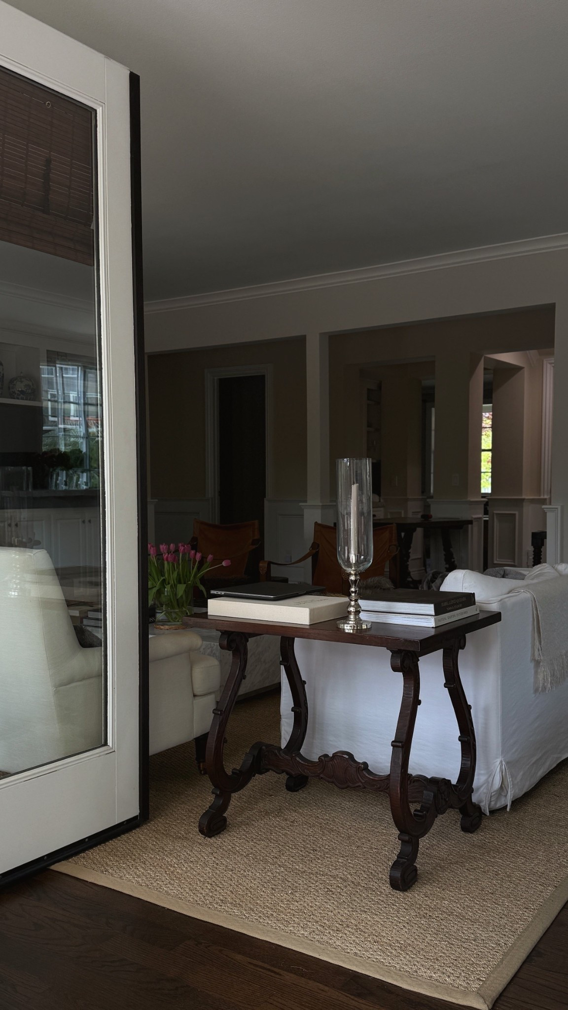 Seagrass rug , living room inspo, Spanish table, pottery barn, silver glass hurricane, white couch 

#LTKHome