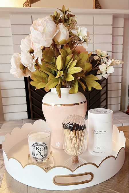 New living room home decor: pink and gold ginger jar, Diptyque candle and candle holder, decorative matches, Sézane perfume 

#LTKhome #LTKSeasonal