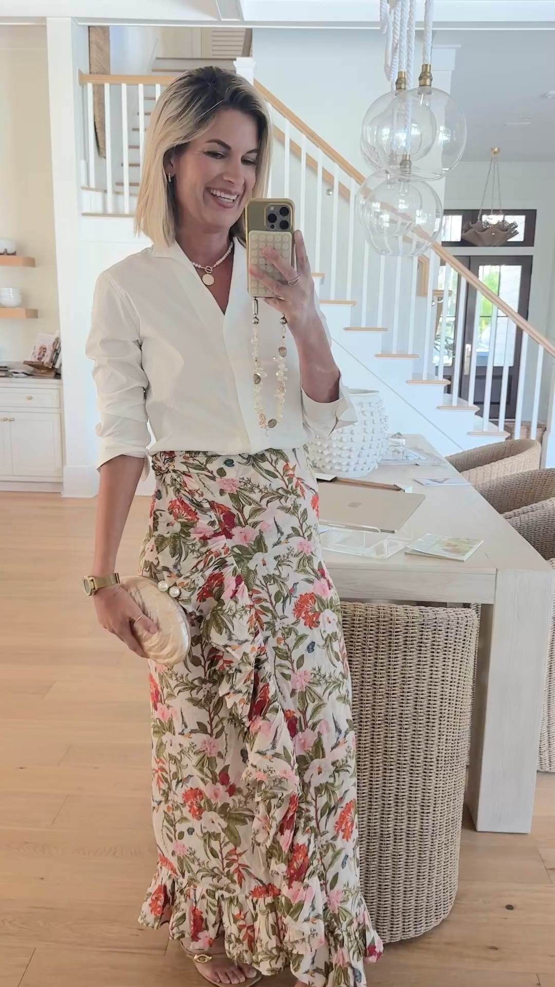Vacation outfit!  I am in size 1 in the wrap skirt and small in the button down.  Sandals true to size.  Clutch is a fun save option.

#LTKOver40 #LTKTall #LTKTravel