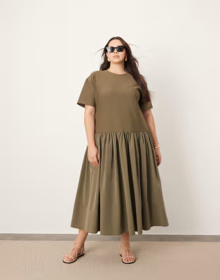 ASOS EDITION Curve – T-Shirt-Kleid aus Jersey in Olivgrün mit tief angesetzter Taille und kont... | ASOS (Global)