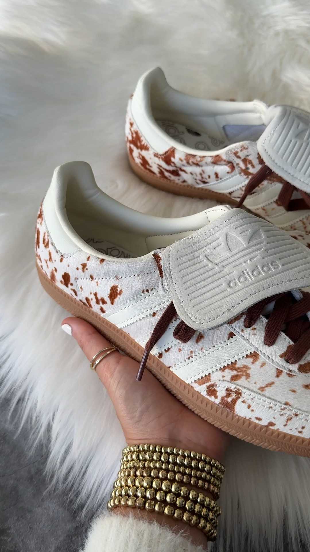 Adidas cow print samba long tongue cow print sneakers. Now $68 at checkout with code SPRING