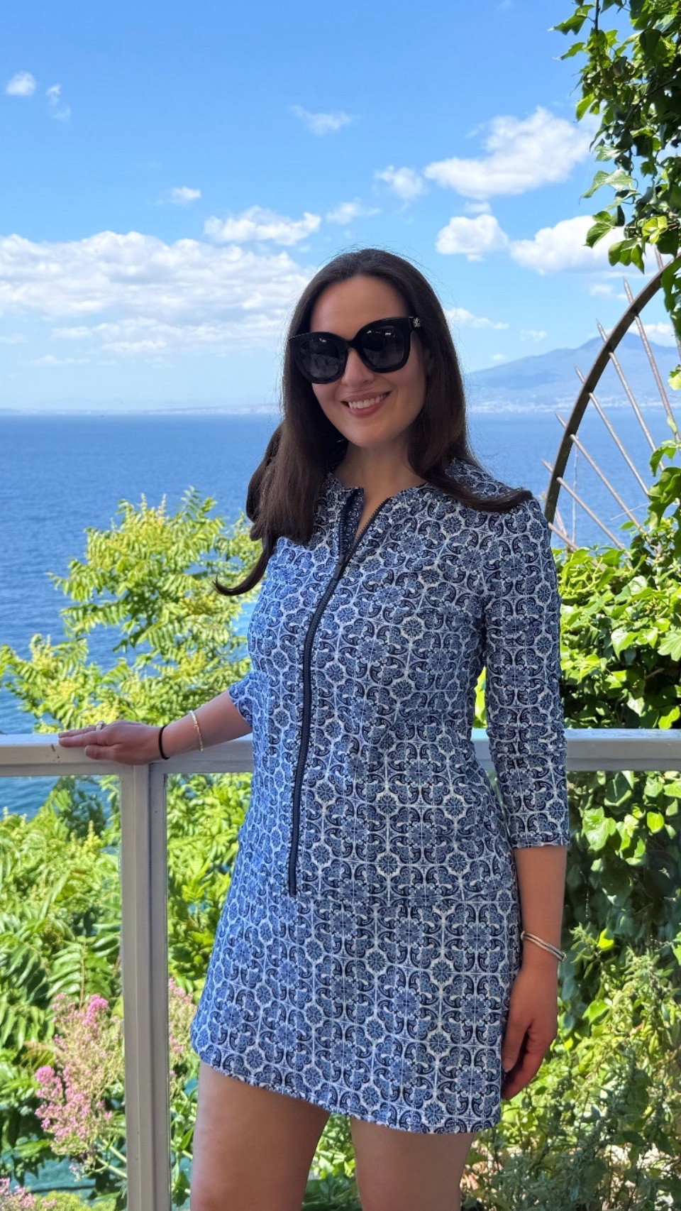 vacation outfits beach - Tommy Bahama’s terrazzo title design swimwear perfect to wear for Spring Break on the beach or vacationing on the Amalfi Coast this Summer.  Wearing a medium in the swim skort and small in the rash guard jacket. #LTKSwim

#LTKOver40 #LTKTravel #LTKSeasonal