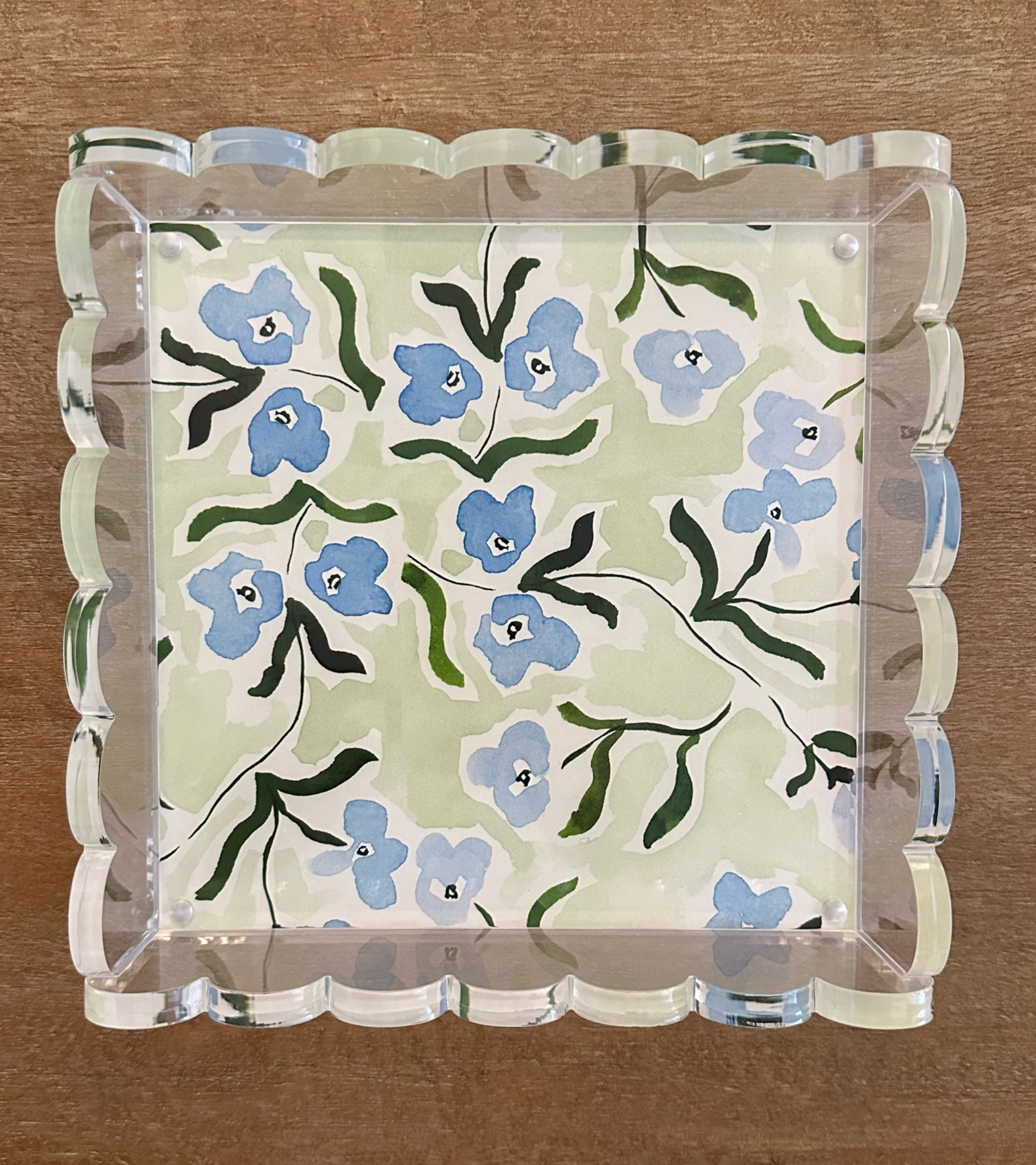 This scalloped edge acrylic tray (8x8) is such a fun find! The bottom tray is attached with magnets so can slide in different designs for a completely different look — this is one of my favorite wallpapers from Evelyn Henson ✨

Tip: you can use any paper or wallpaper cut to 8x8 and Evelyn’s wallpaper samples are almost a perfect fit — just need a little trimming! 

#LTKHome #LTKGiftGuide #LTKFindsUnder50