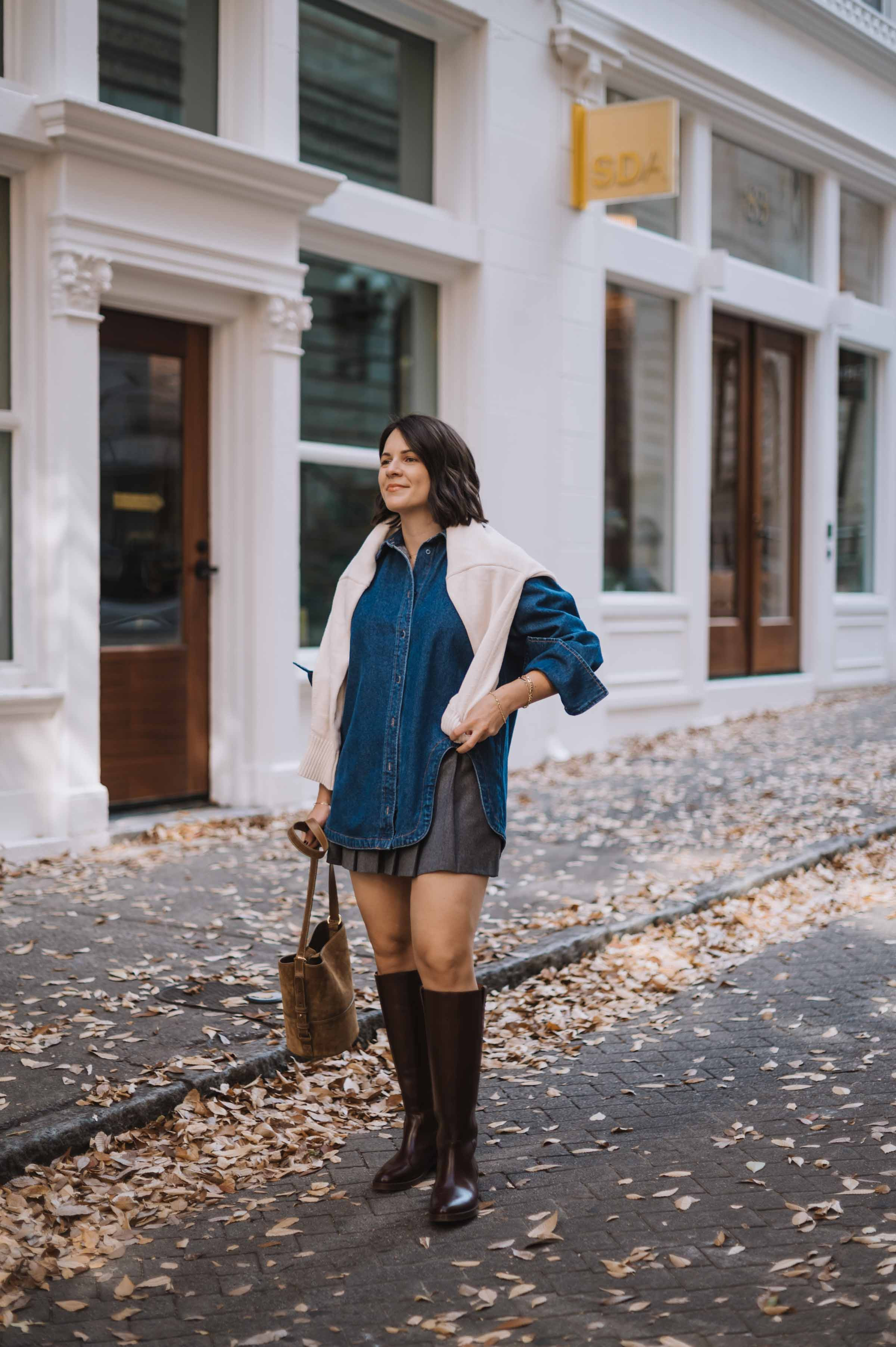 pleated mini skirt with knee high boots and an oversized denim shirt. linking similar options. 

 #LTKootd #LTKSeasonal #LTKFindsUnder100