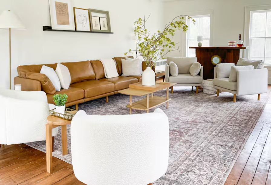 Warm wood tones and soft neutrals layered throughout this living room.
Linked exact and similar pieces below. 

 #livingroomdesign #neutralhome #interiordesign 

#LTKHome #LTKSaleAlert