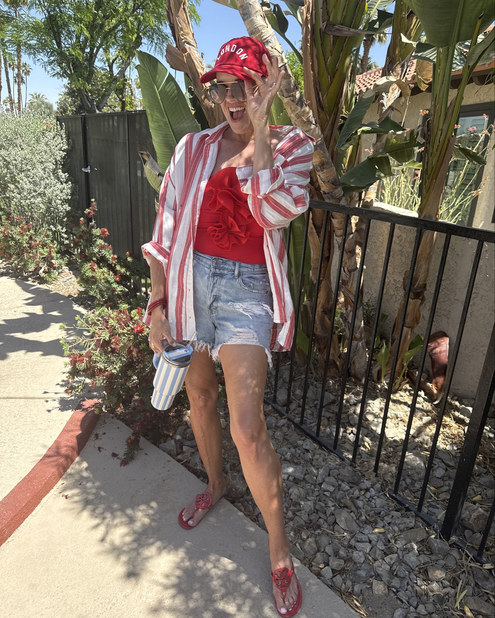 Poolside/beach/ vacation
Outfit inspo🚨

Sale alert 🚨 
Old navy 50%off this cute red and white stripe button up
Fits tts but I did size up for
An over sized look

Denim shorts by American eagle a go to denim style for me. Fit tts but I went up one size as they’re high waisted and I like them baggy 

Tory Burch miller sandals 

Red one piece swimsuit by flax maker tts in a small

London baseball cap 

Stanley tumbler 

Sunnies by Chicos linked similar 

Budha girl bracelets 

#LTKOver40 #LTKSaleAlert #LTKSwim