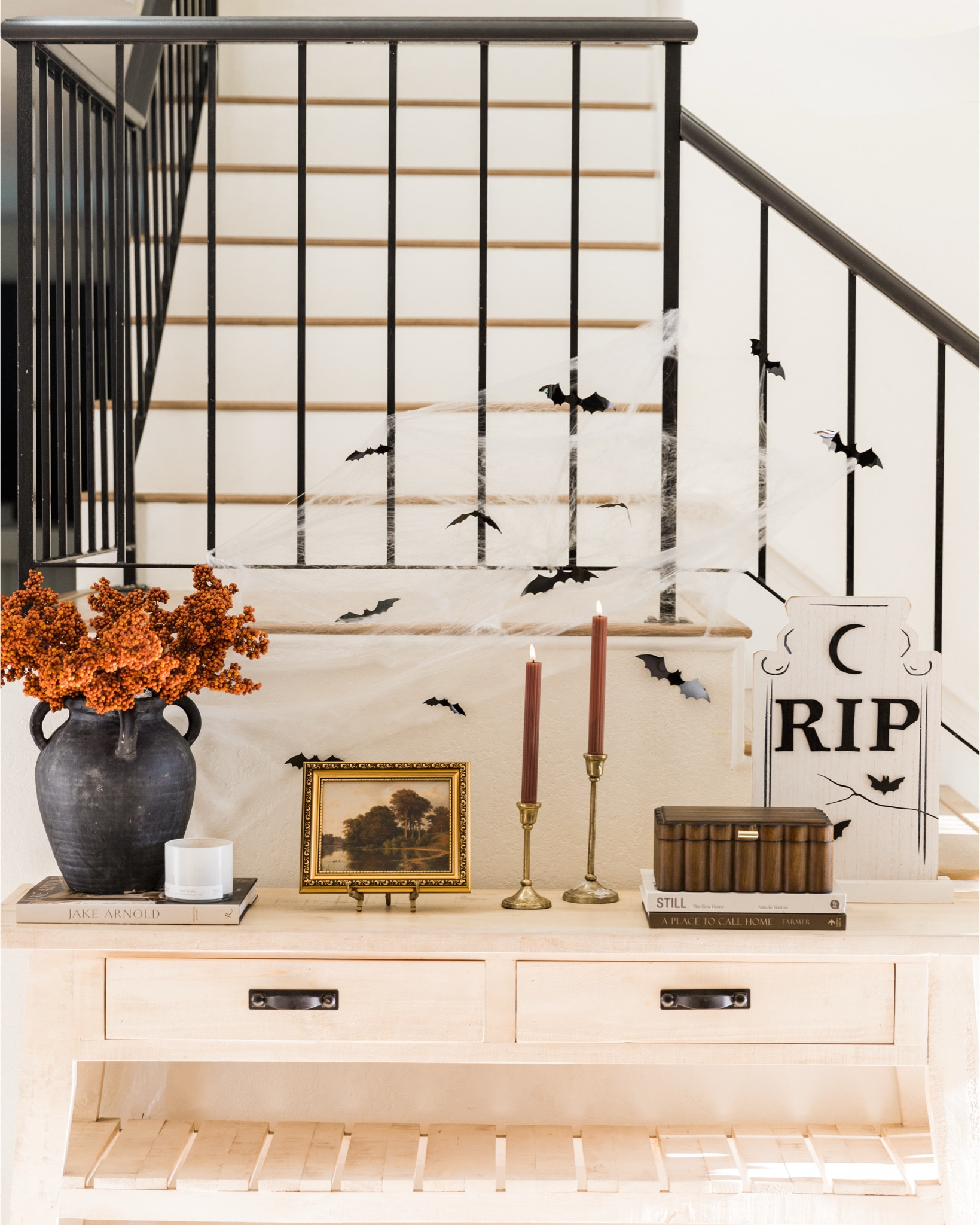 A little touch of Halloween without the creepy, crawly, or scary. These fall florals are $5 and the candles are flickering LED. I’m loving them in the evenings for cozy fall vibes! 

P.S. this is the first official post of our new house! Can’t wait to show you all the things we’ve been beautifying over here!

#LTKHome #LTKHalloween #LTKSeasonal