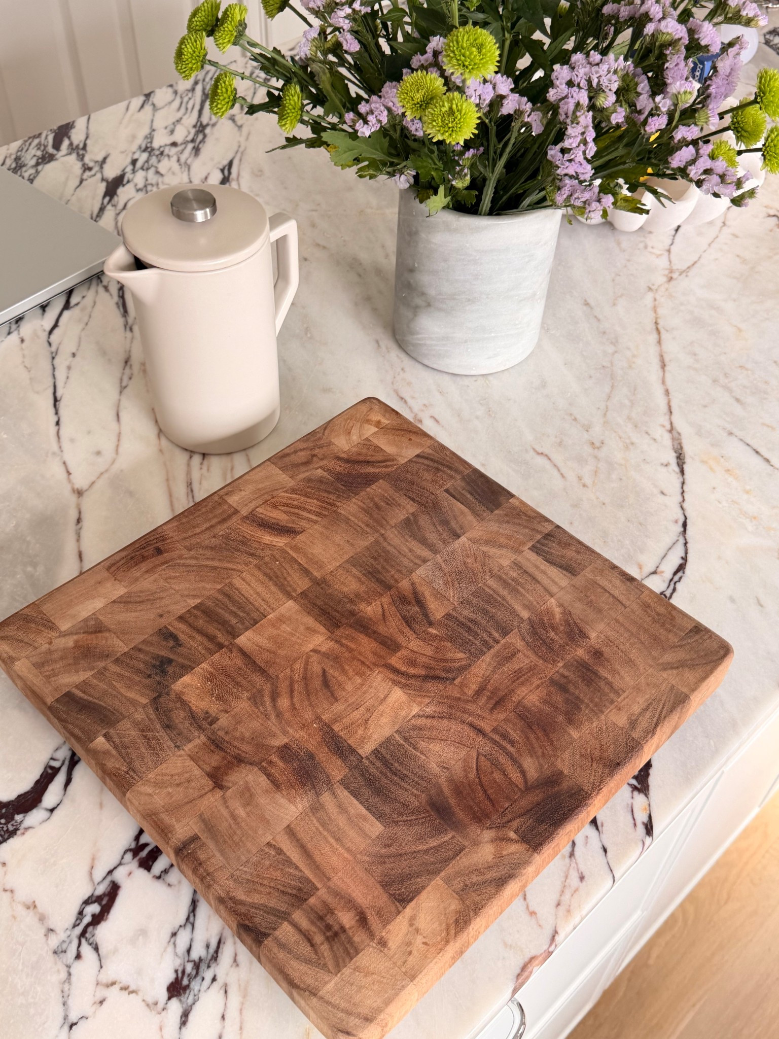 This cutting board is the best I’ve found so far. Perfect size, elevated, not too heavy but durable. 💗