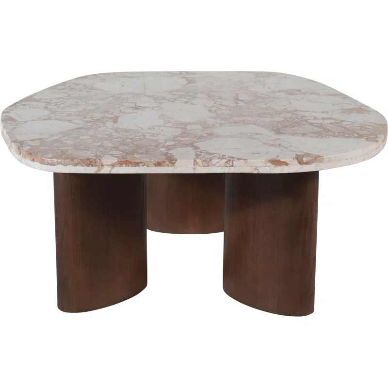Creamy breccia marble with rich veining sets the stage for the coffee table's luxurious appeal. S... | Wayfair North America