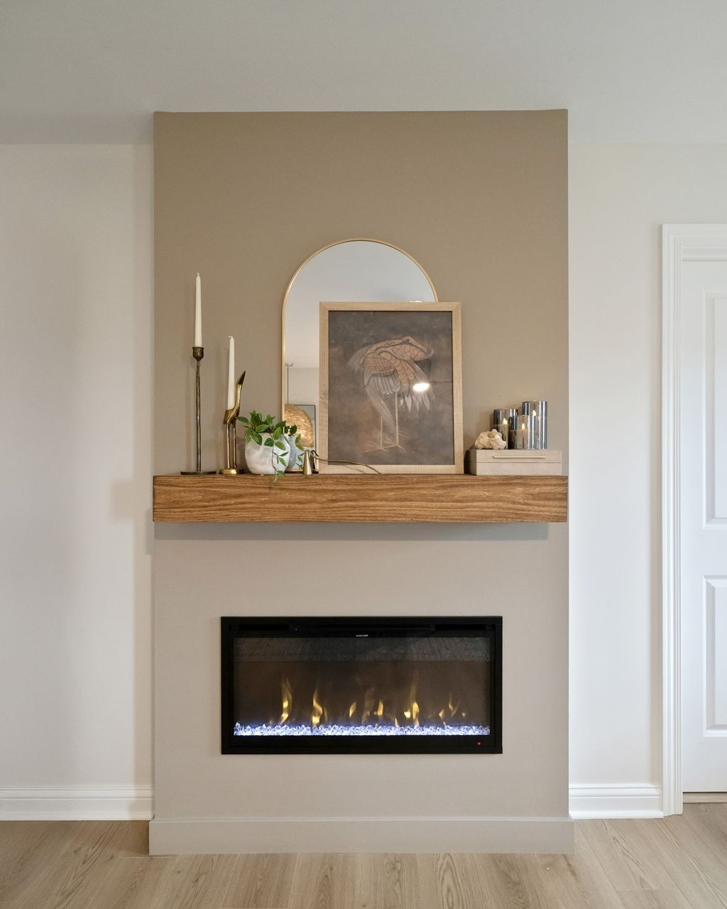 Our primary bedroom finally has the cozy focal point it was missing ✨ This DIY fireplace + custom mantle completely transformed the space. Linking everything from the electric insert, the mantle, artwork and styling pieces. 

 #LTKSeasonal #LTKHome #LTKStyleTip