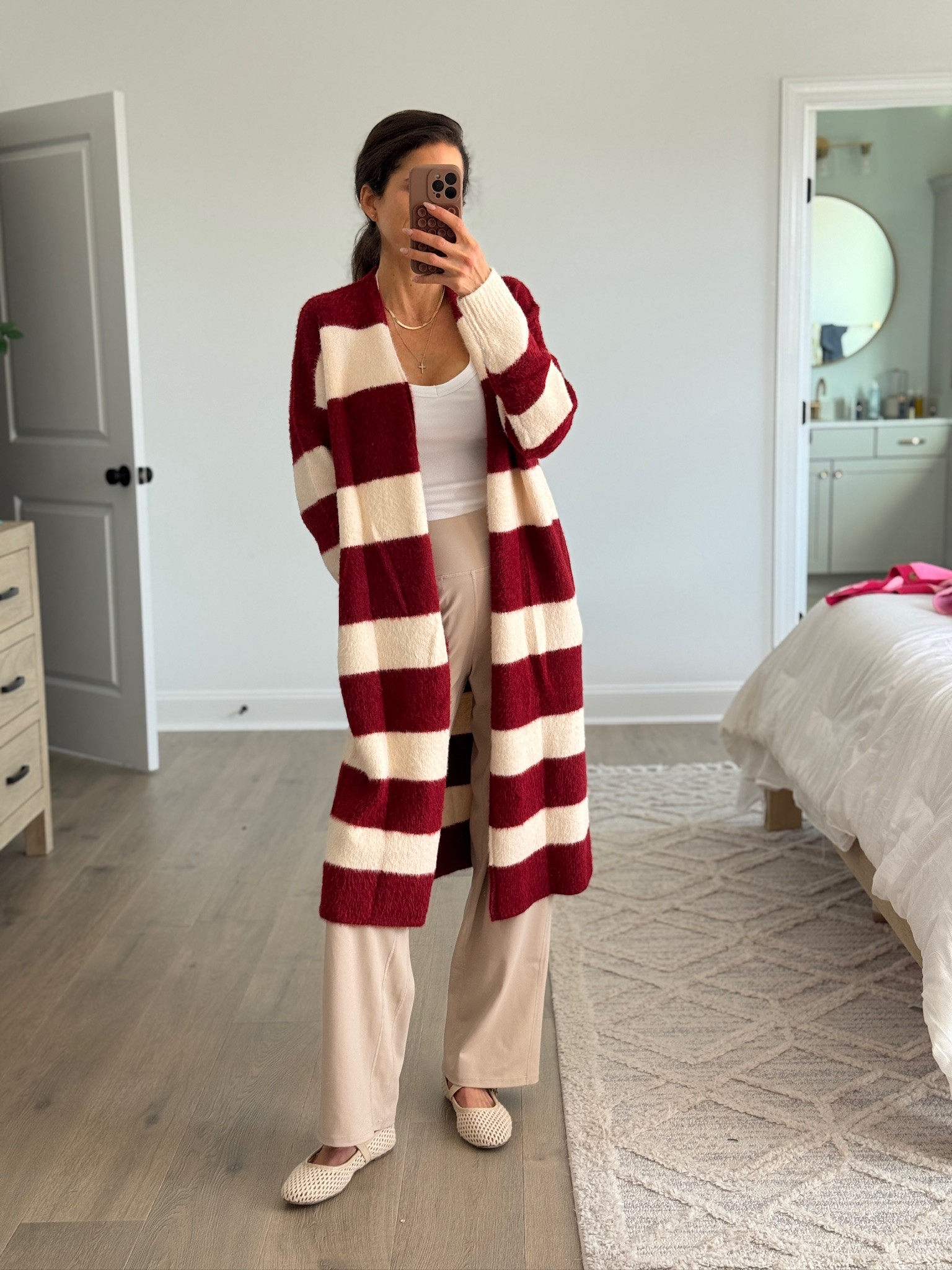 Classic cozy layer that makes an outfit feel pulled together. Long striped cardigan with a relaxed fit, styled over a simple tank and wide-leg pants for an easy, comfortable look. Perfect for everyday wear, casual outings, or when you want something cozy but still polished. A great neutral base with just enough contrast.

Casual outfit, everyday outfit, striped cardigan, long cardigan outfit, cozy layers, wide leg pants, neutral outfit, casual chic style, mom outfit, affordable fashion

#LTKmomlife #LTKSeasonal #LTKootd