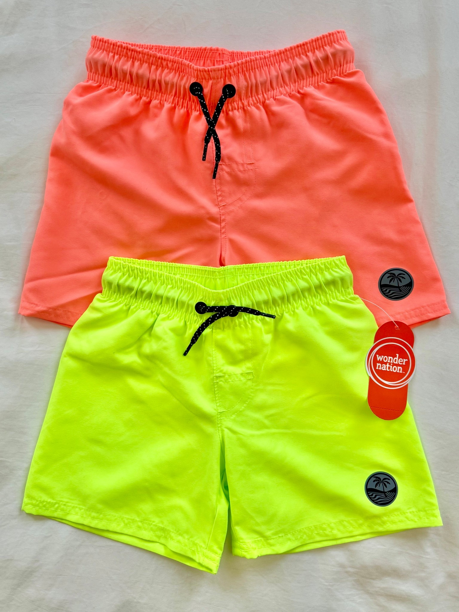 Neon swim trunks > every other color.

If you’ve followed me for a while, you know I always choose high-visibility swimwear for my boys. Neon yellow and bright orange are some of the easiest colors to spot in a pool, lake, splash pad, or crowded beach — especially compared to darker blues.

These Wonder Nation boys swim trunks are that perfect shorter trunk style I love: UPF 50+, elastic waist, quick-dry, lightweight, and budget-friendly. And they are even brighter in person than they look online at Walmart — truly fluorescent.

I’ve paid 5x more for this same look before, so I grabbed the next two sizes up in both colors.

Linking these neon boys swim trunks + more bright kids swimwear below.

#LTKKids #LTKSeasonal #BoysSwimwear #SwimSafety

#LTKmomlife #LTKBaby #LTKKids